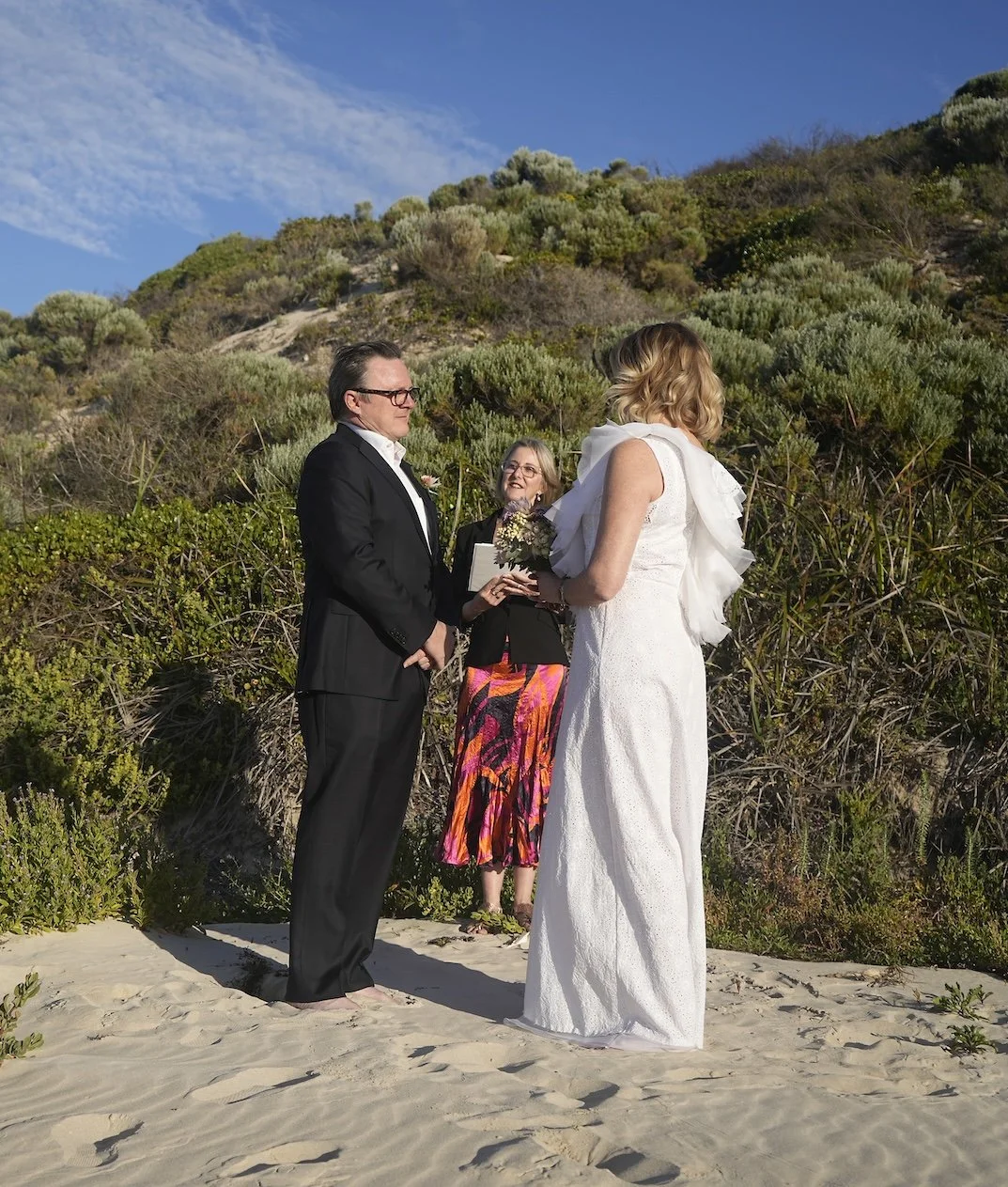 Couple getting married on beach.JPG
