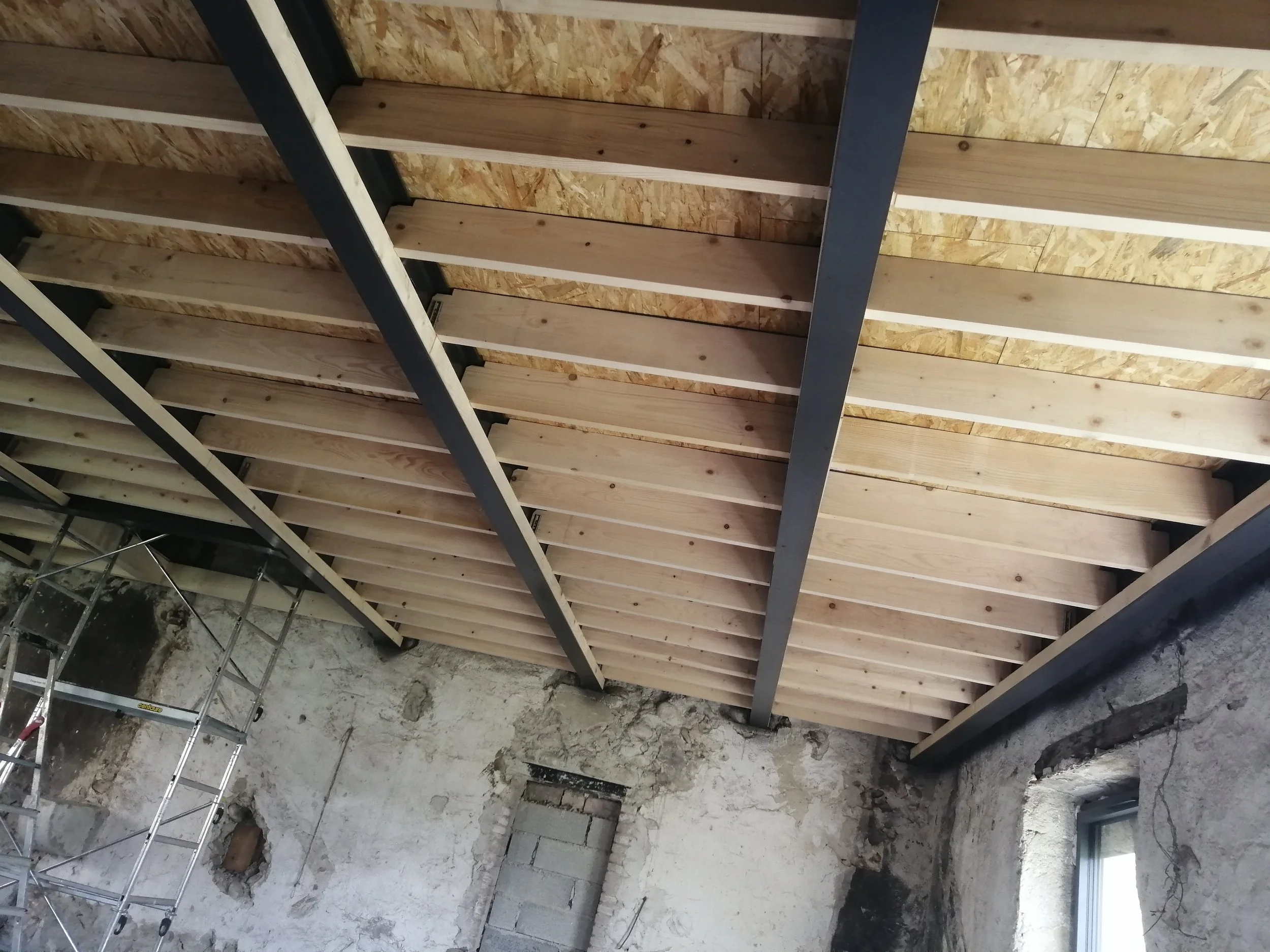 pose de plancher en osb mezzanine.jpg