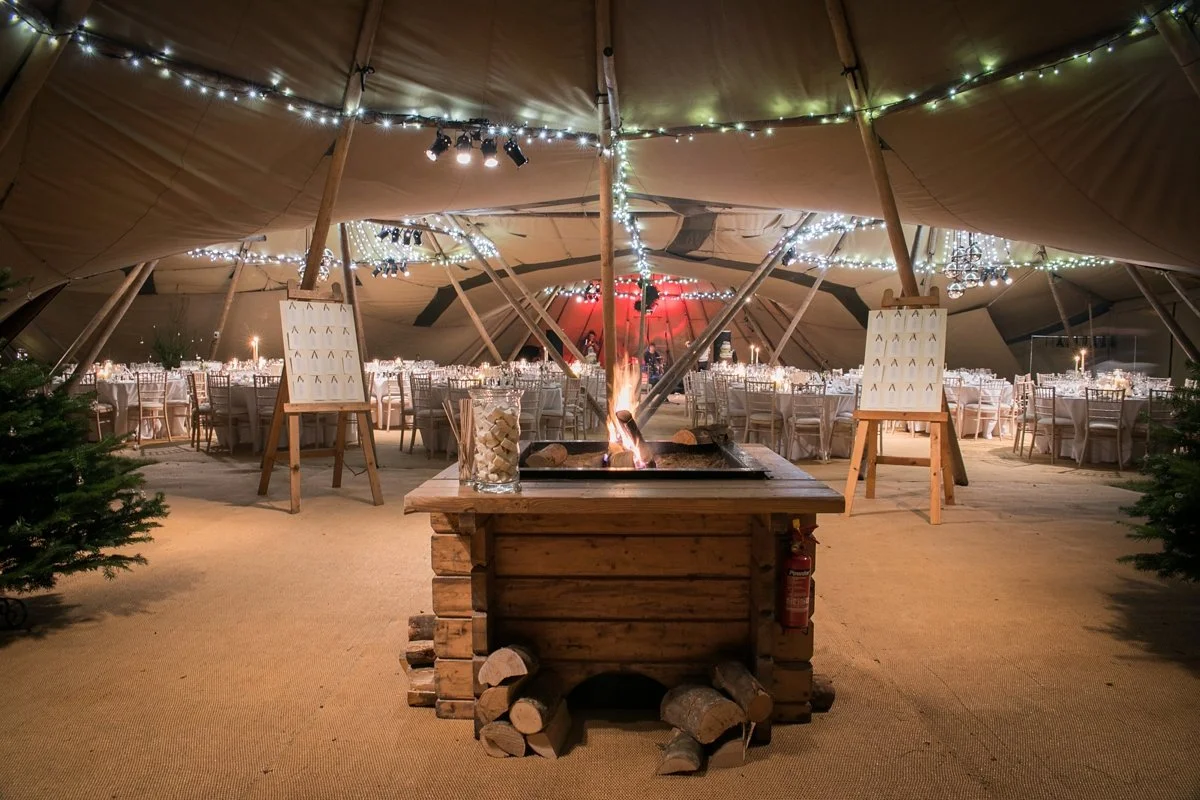 Firepit tipi wedding with world inspired tents