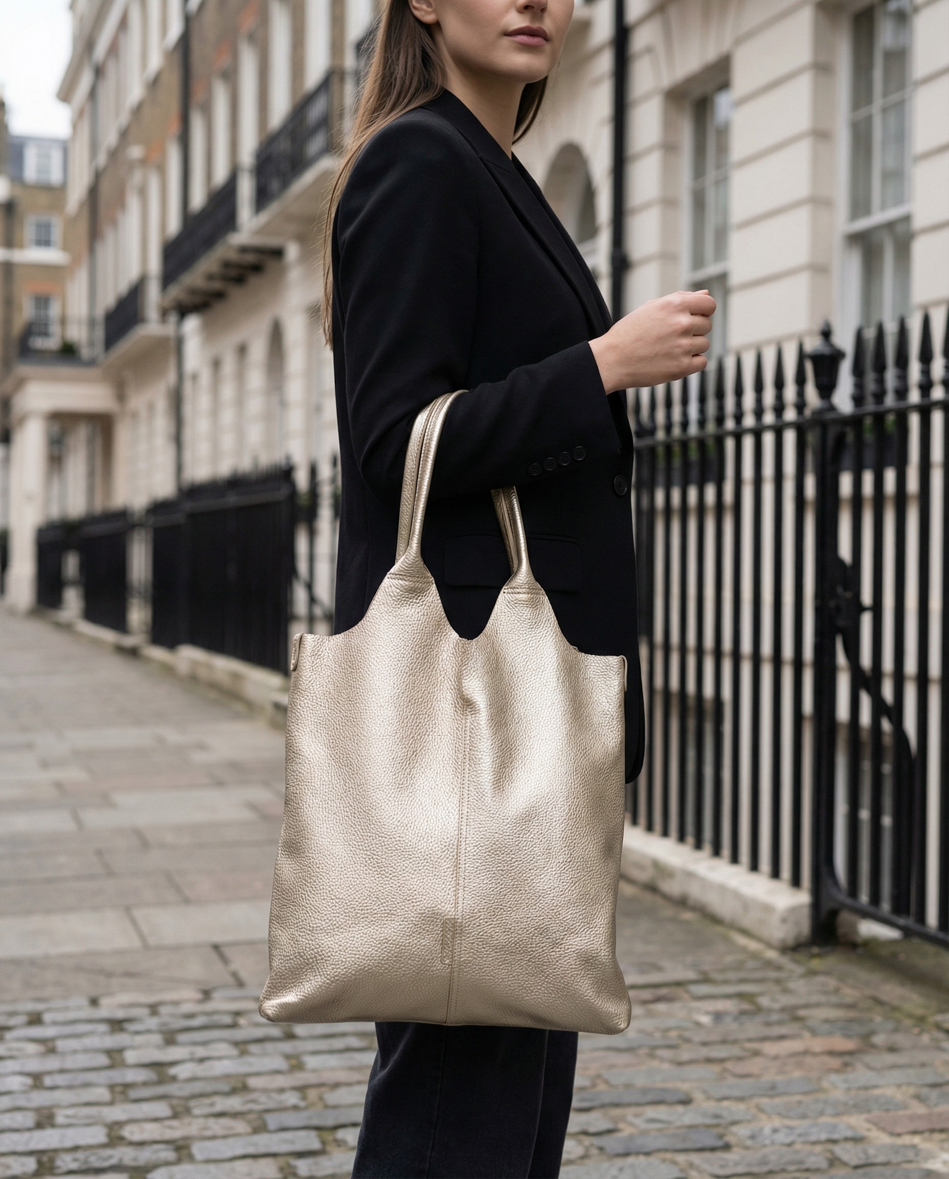 Bold beautiful haired woman with gold bag