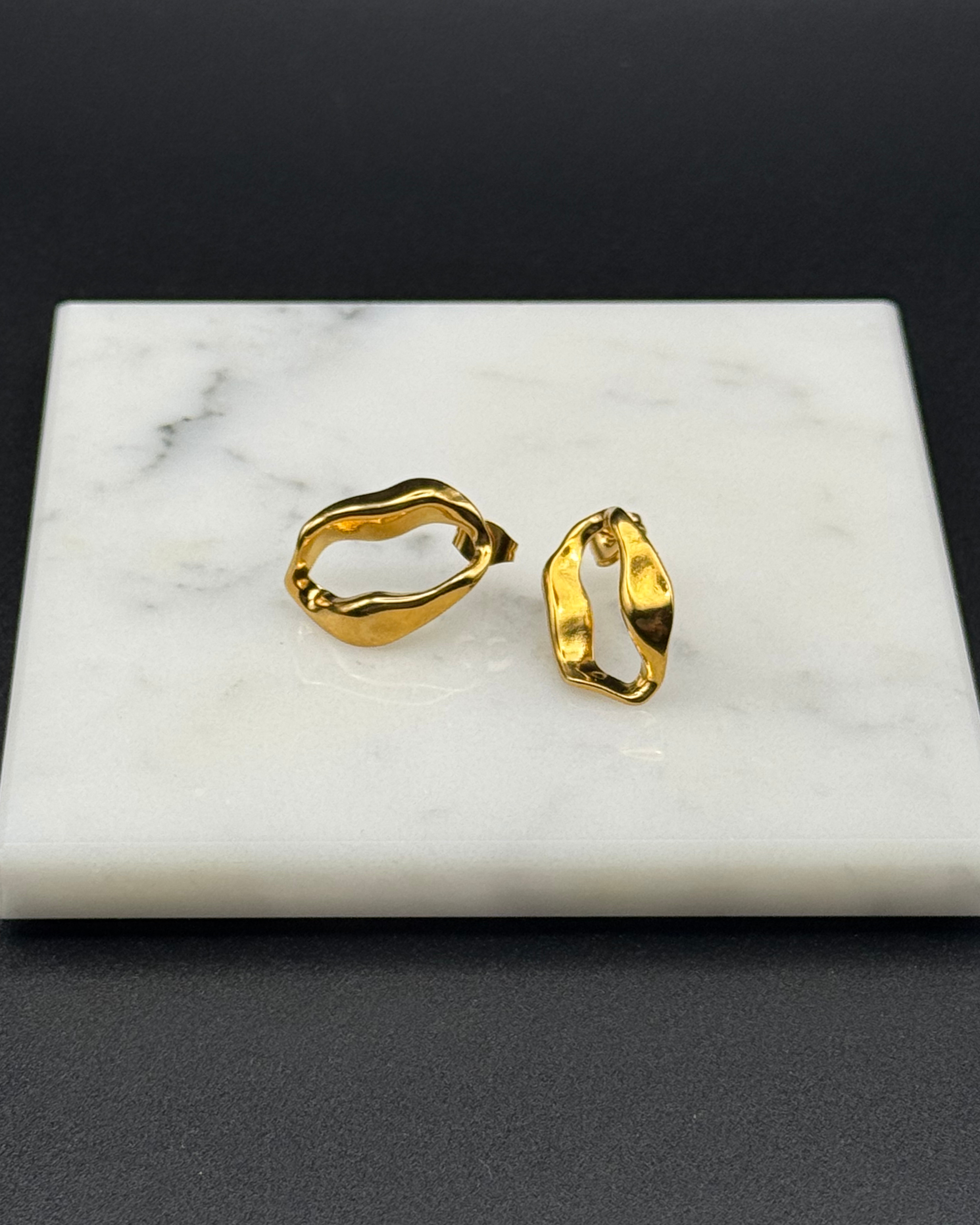Kika Earrings, Drop Stud earrings in the shape of an irregular oval. 18K Gold Plated Stainless steal, waterproof. Emilia Burk