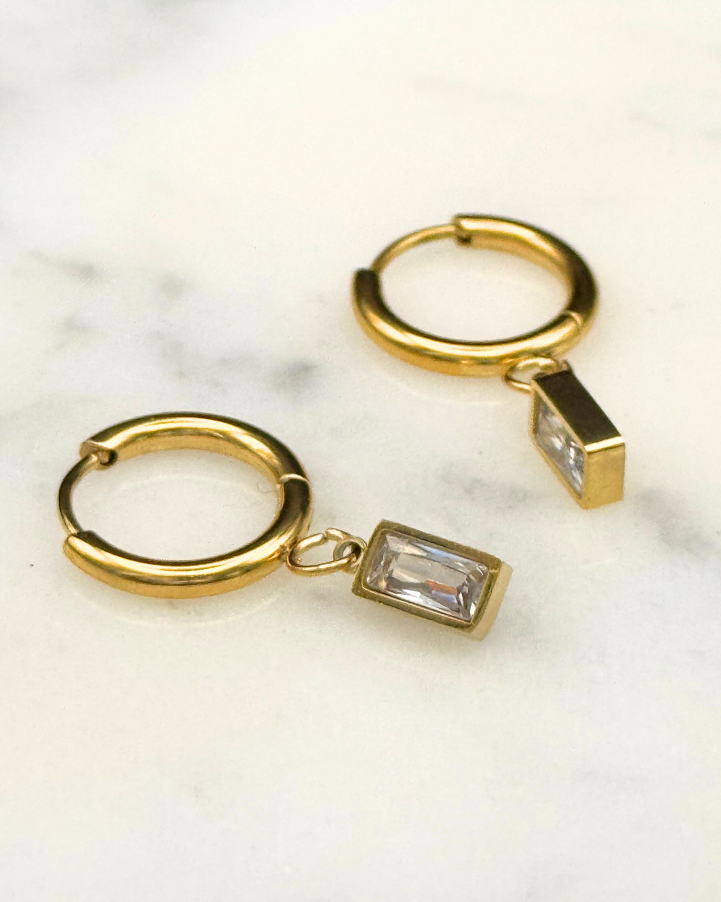 Radiant Drop Waterproof Hoop Earrings – Gold Huggies with Baguette Charms | Emilia Burk