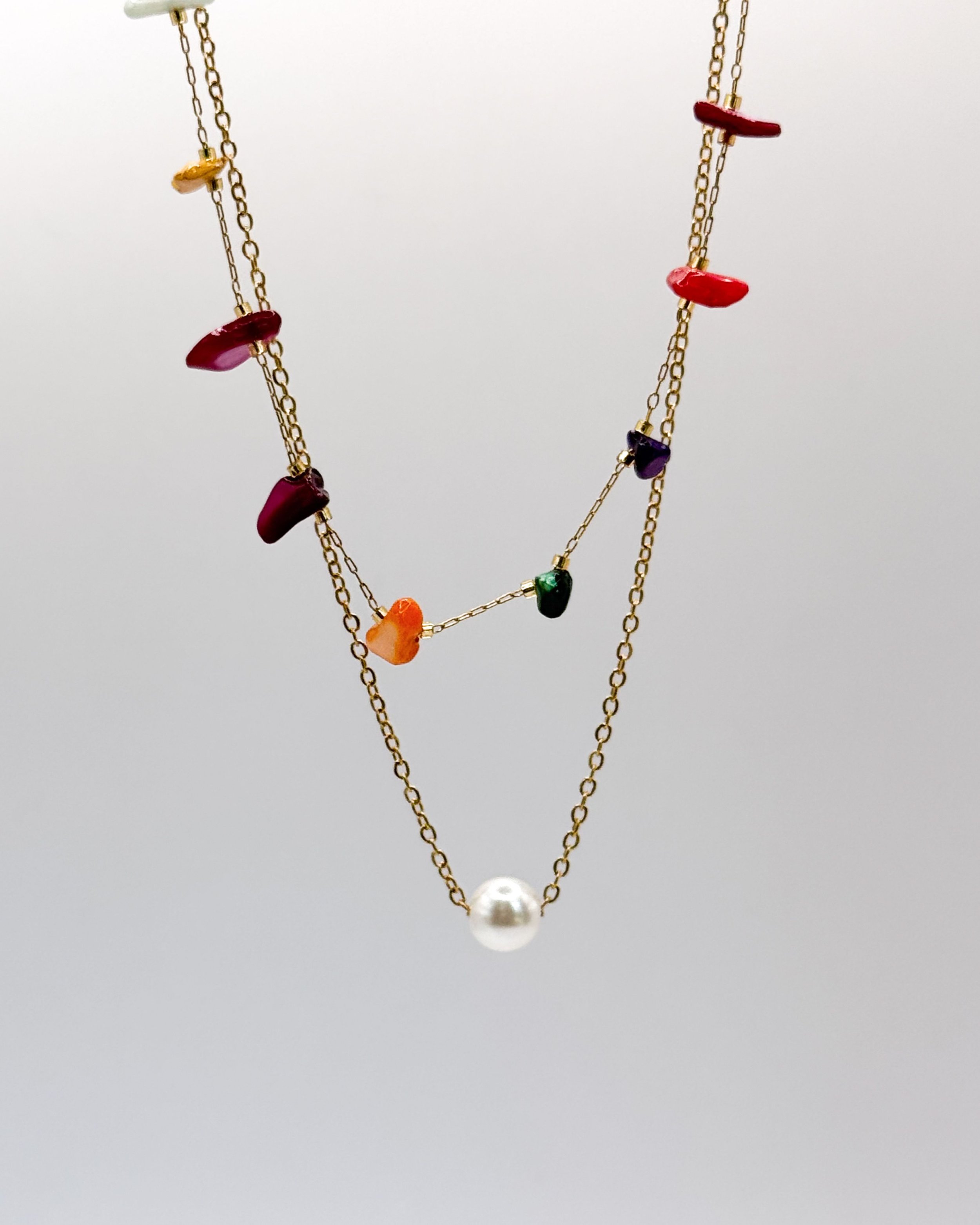 Inma necklace by Emilia Burk – gold chain with floating pearl-look charm, waterproof and tarnish-free
