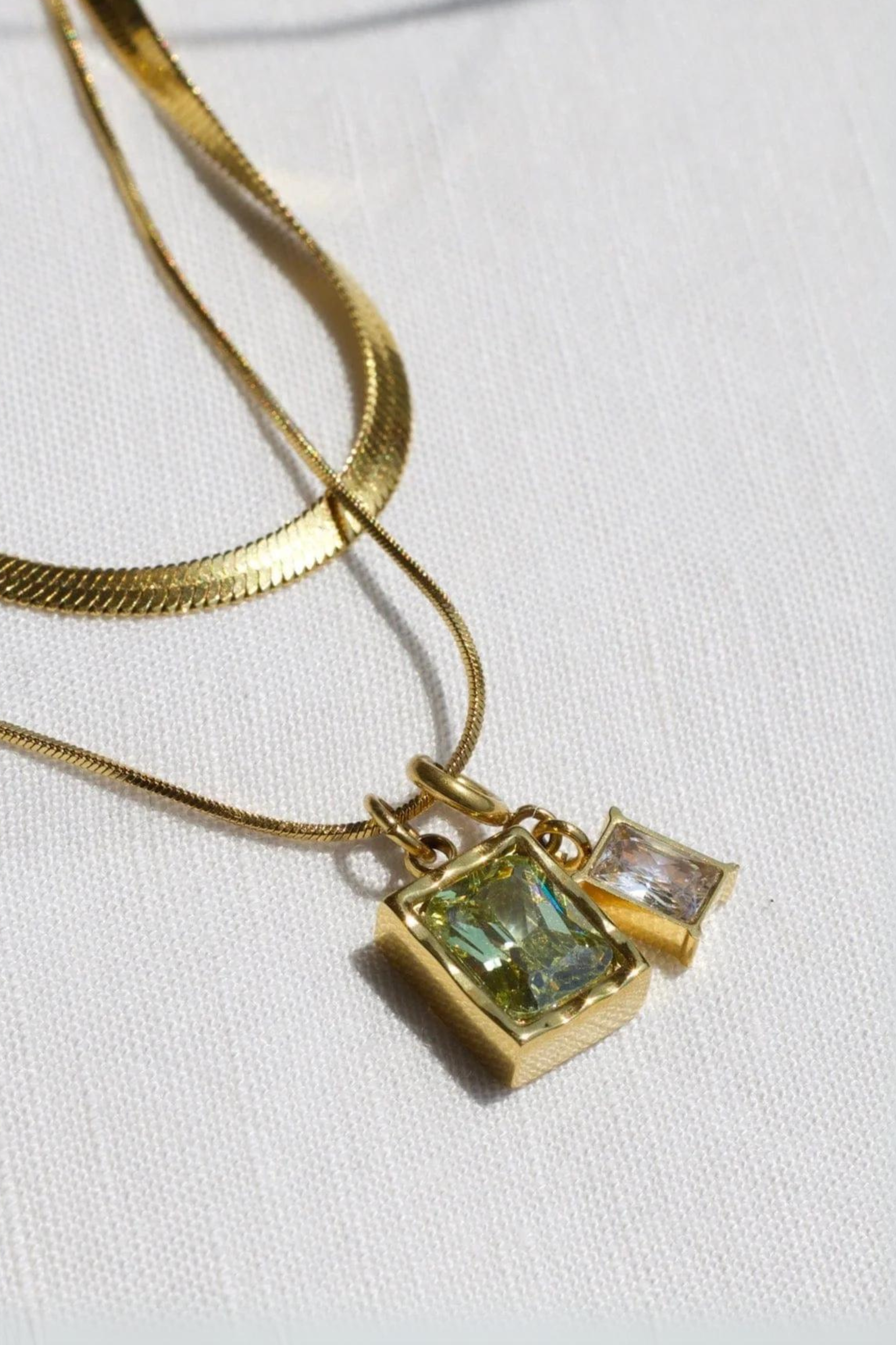 Aicha Duo. Doble Necklace with Snake Chain and Green pendants. Waterproof and dainty. Emilia Burk