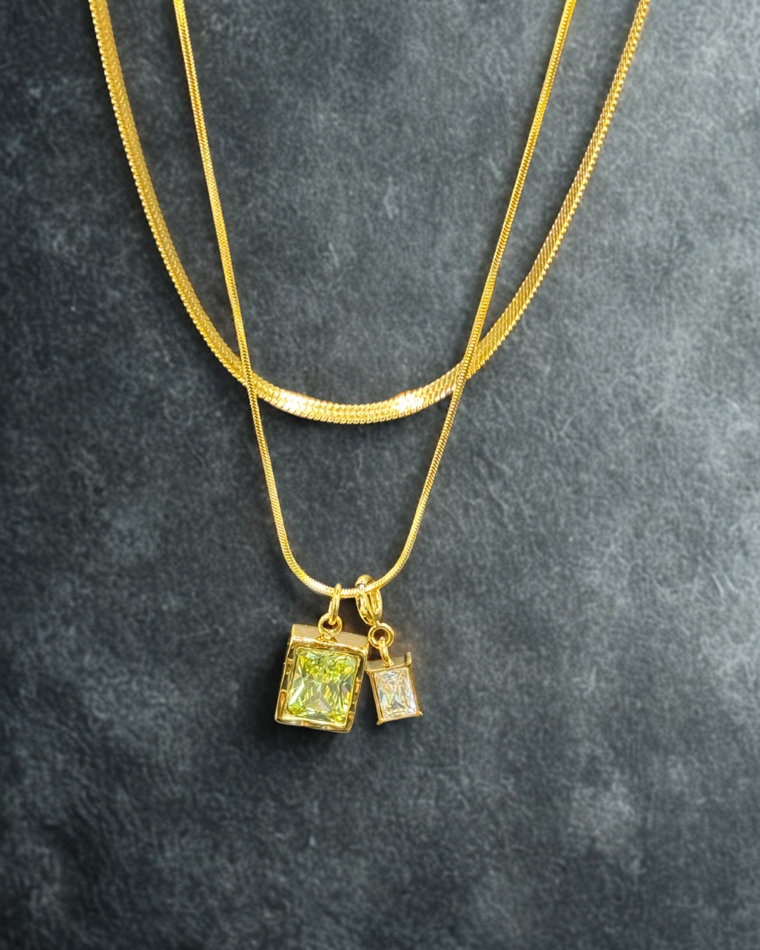 Aicha Duo. Doble Necklace with Snake Chain and Green pendants. Waterproof and dainty. Emilia Burk