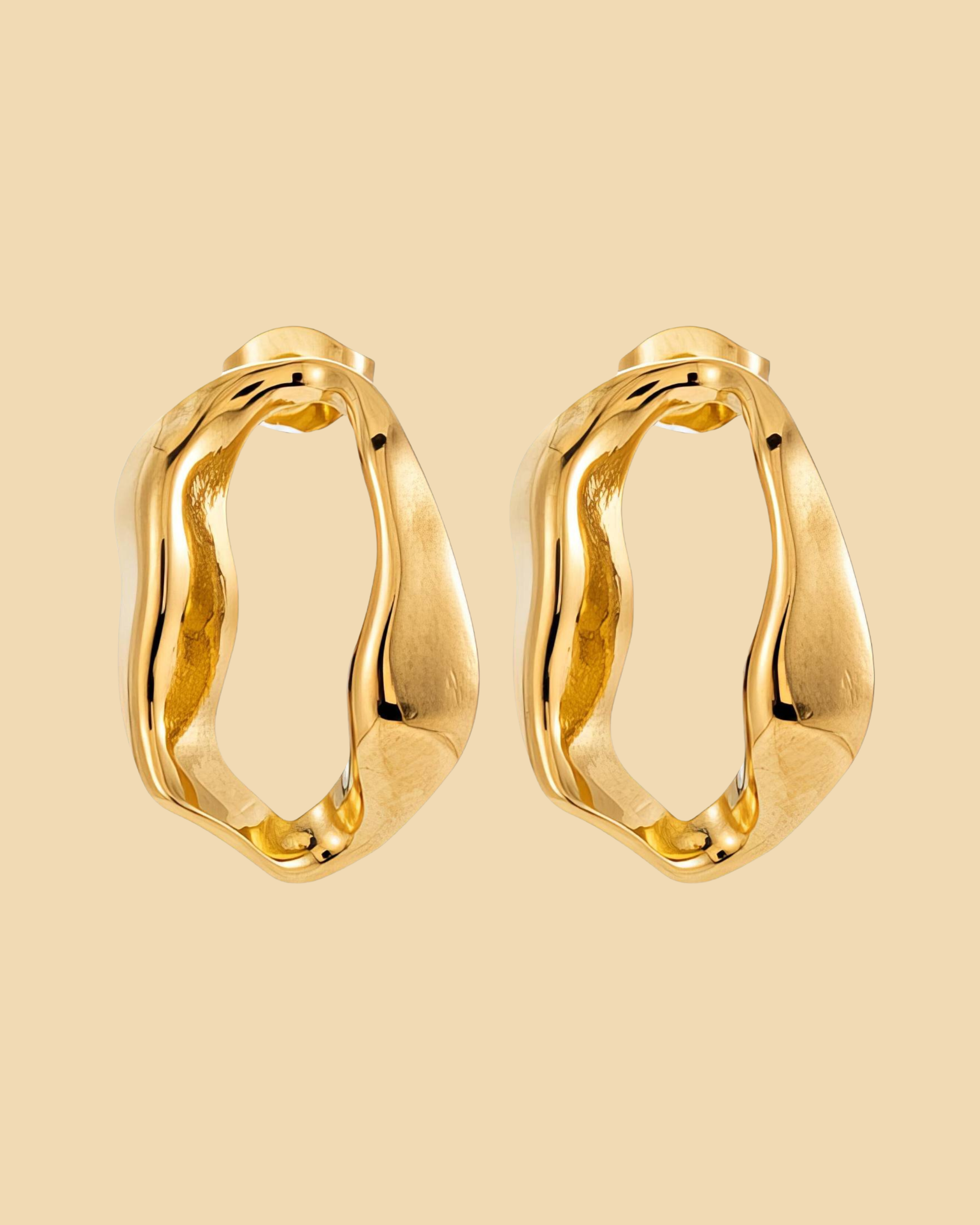 Kika Earrings, Drop Stud earrings in the shape of an irregular oval. 18K Gold Plated Stainless steal, waterproof. Emilia Burk