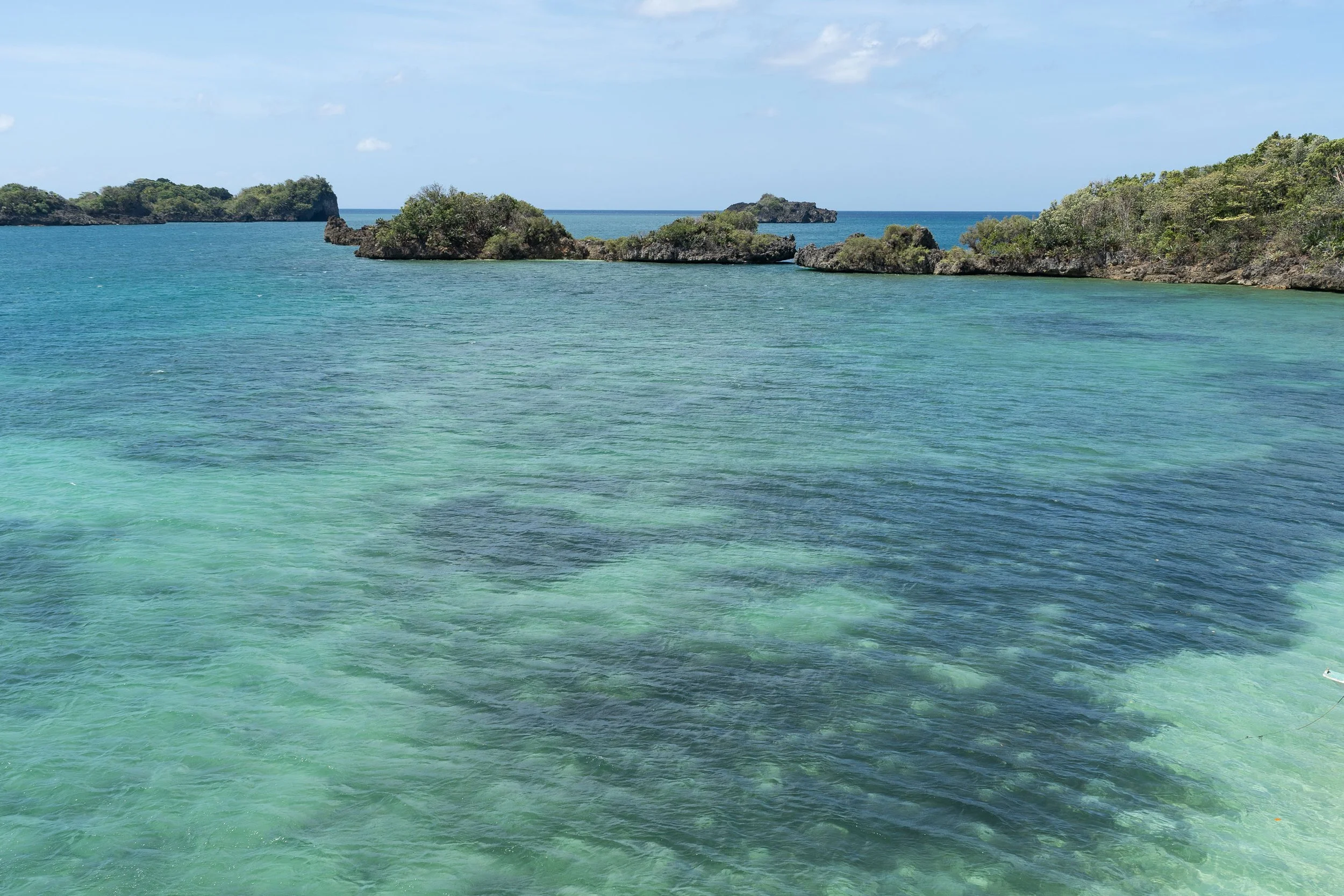 Turquoise ocean views during Guimaras island hopping tour