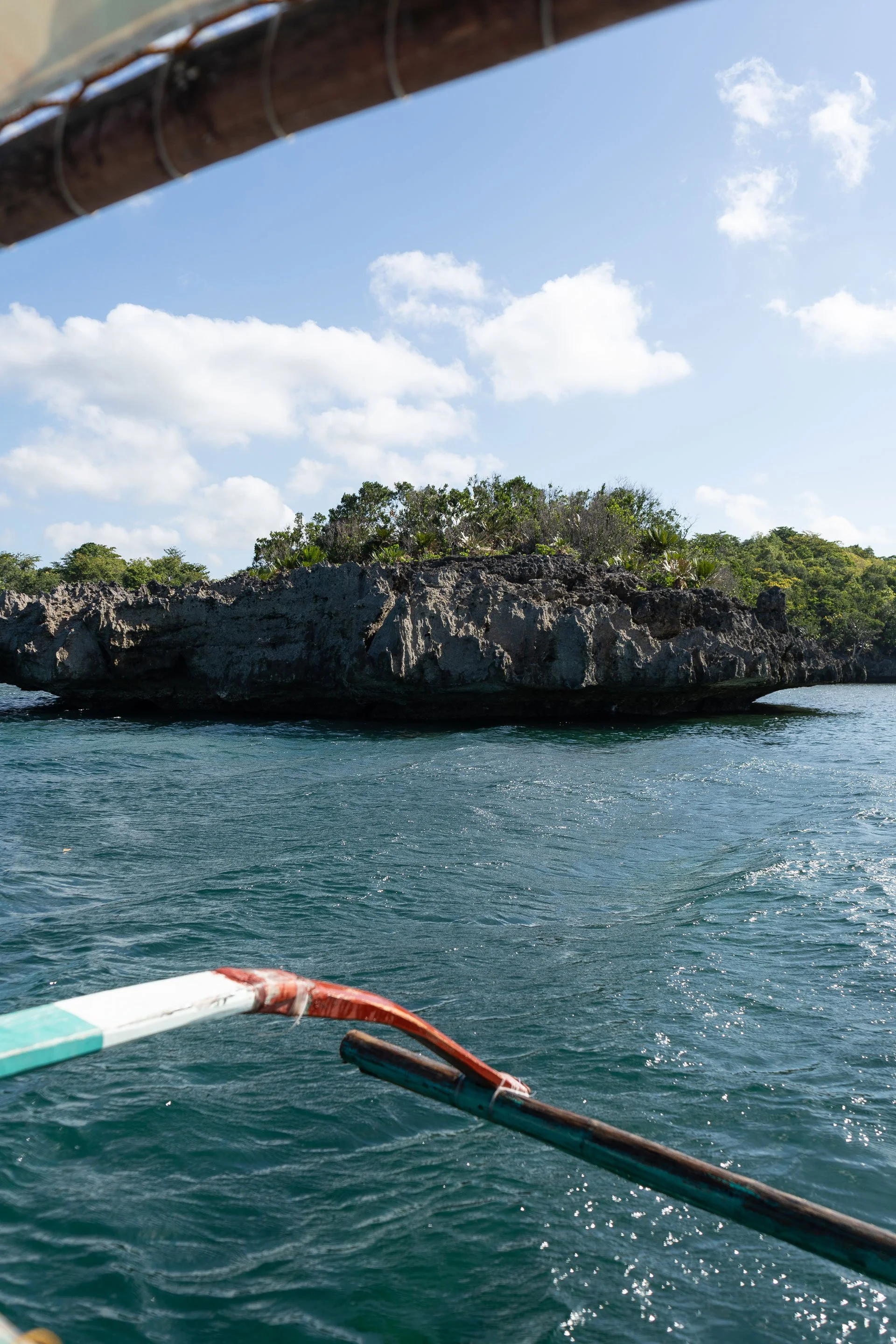 Traveling between islands during Guimaras island hopping adventure