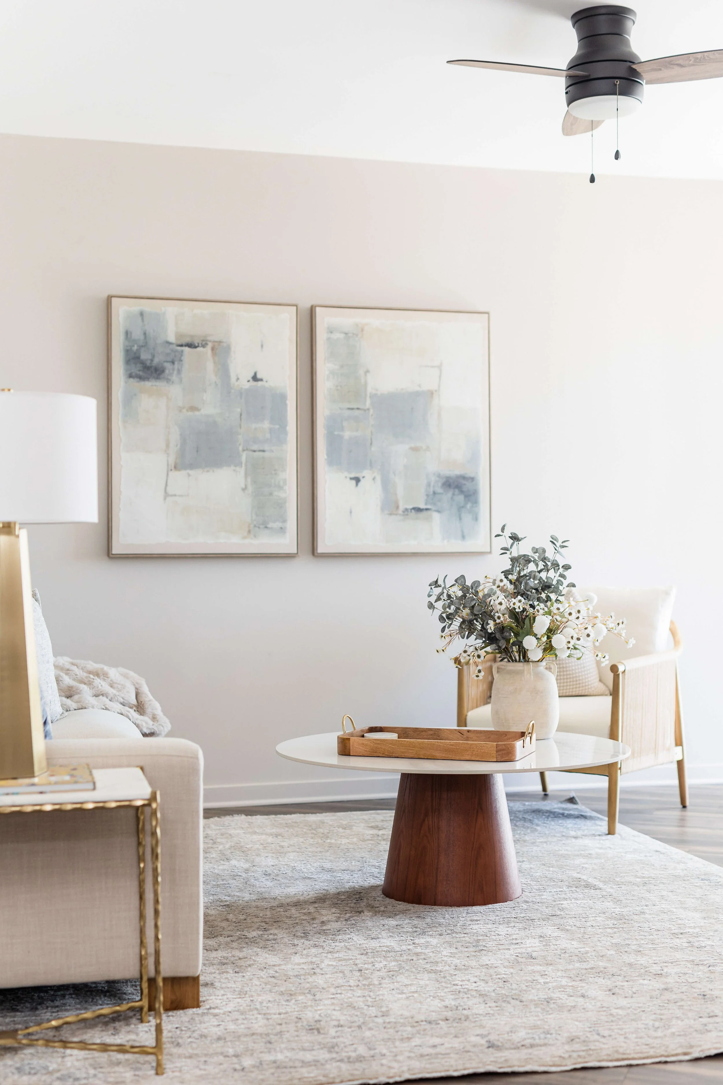 A light-filled coastal living space designed to feel both inviting and elevated, inspired by boutique hotel interiors.