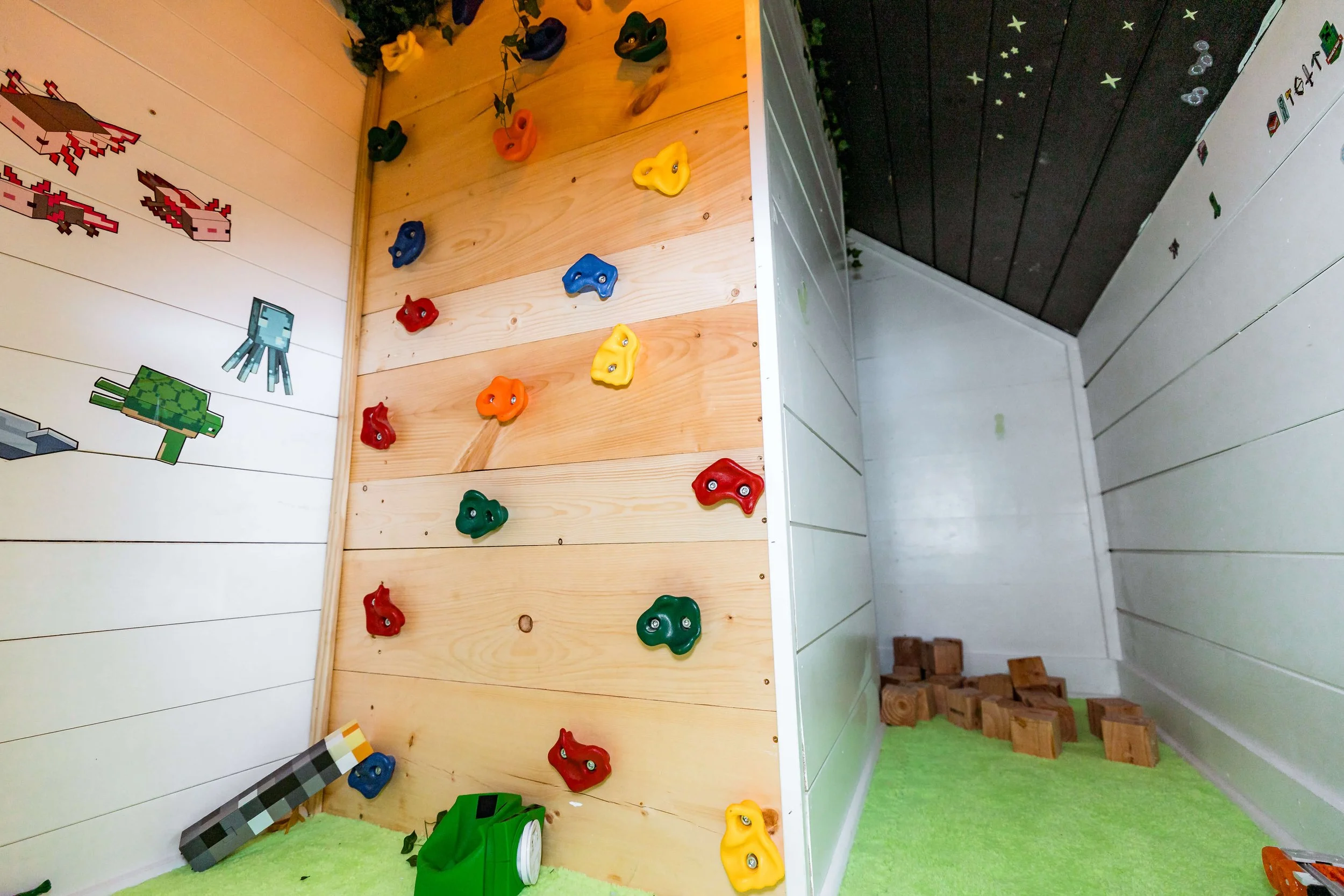 Minecraft-style playroom area with themed blocks and décor.