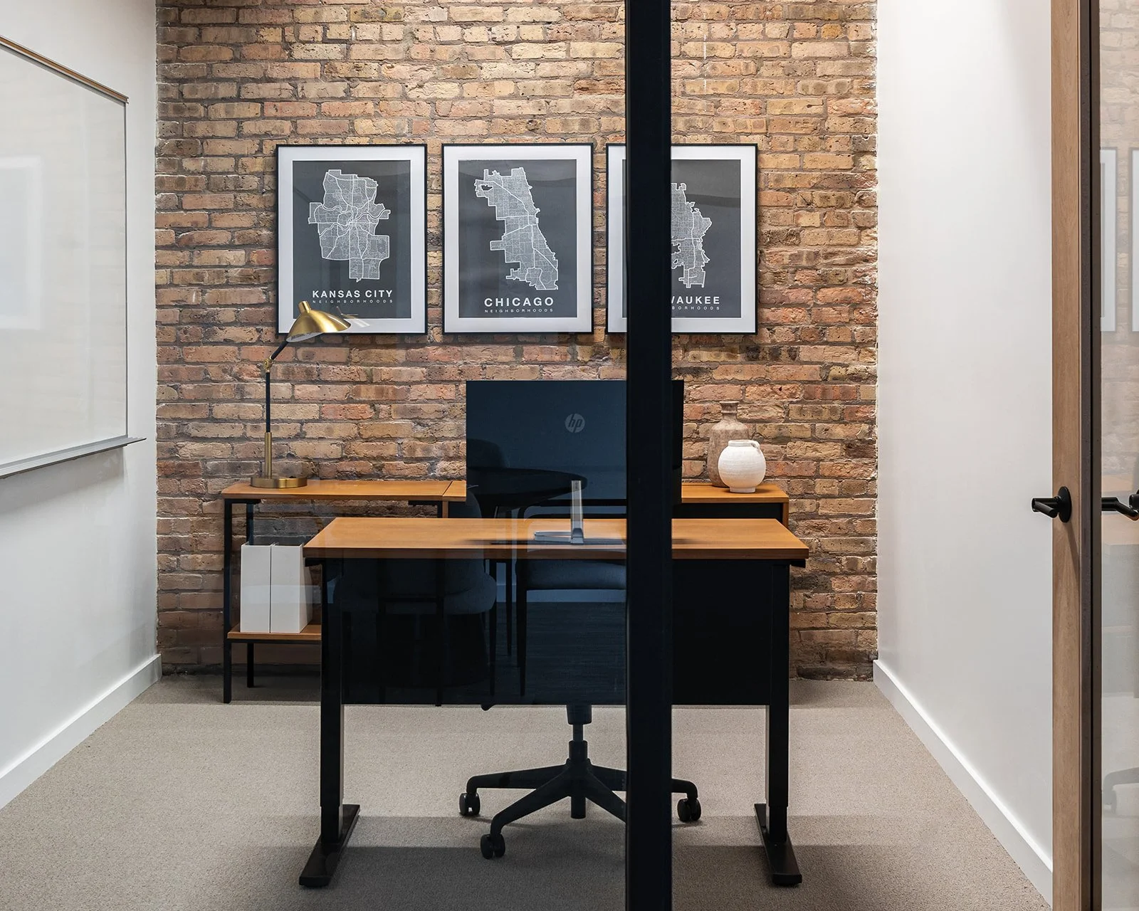 Hoteling office in a chicago loft work space.