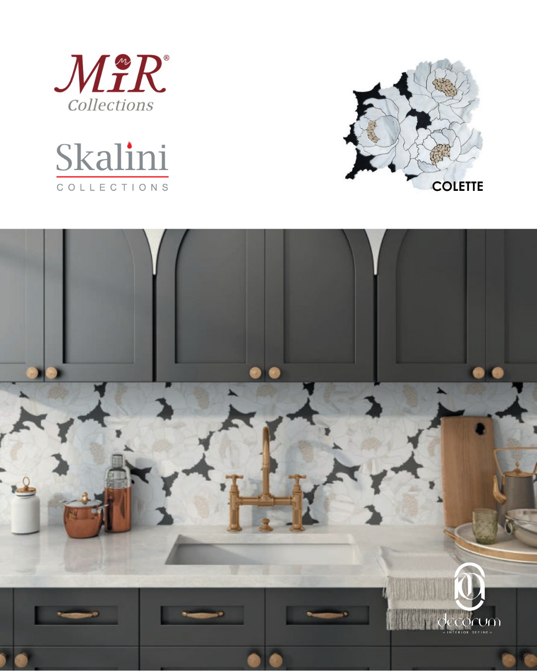 Kitchen with dark gray cabinets, patterned white backsplash with black and beige floral design, gold faucet, and kitchen accessories on the countertop.