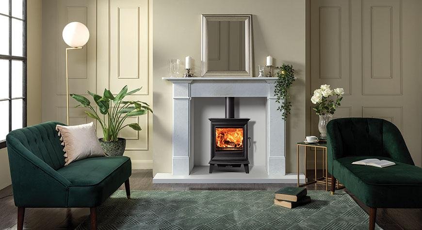 Chesterfield-5-Multi-Fuel-Ecodesign-stove-with-Limestone-Claremont-Mantel.jpg