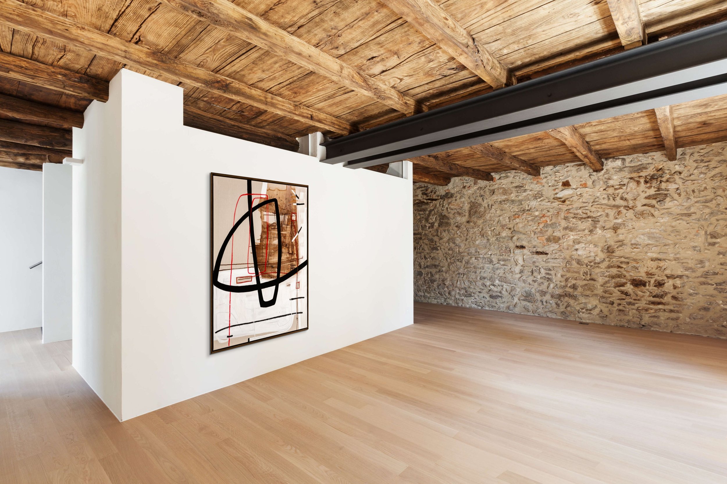 Modern abstract painting in brown and black in barn