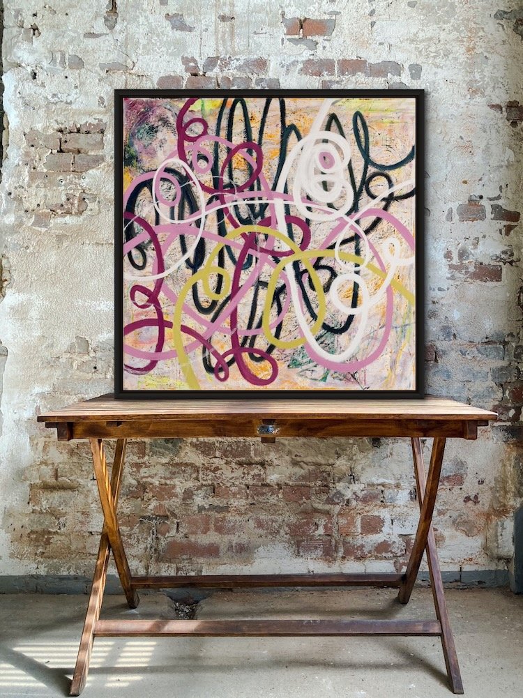 puzzled-abstract-painting-on-desk.jpeg