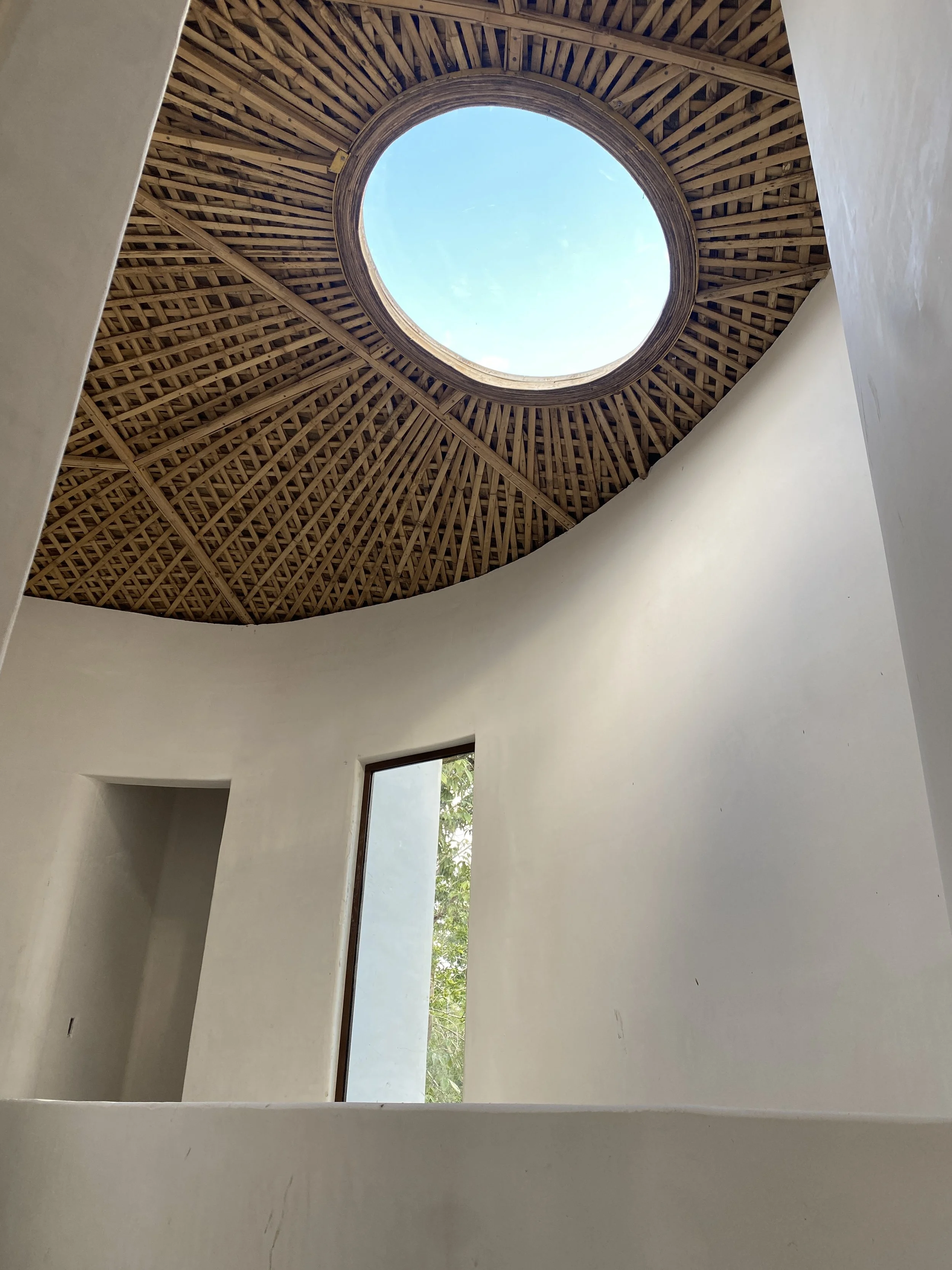 Handcrafted bio-dome structure under construction, highlighting sustainable building techniques for living in Tulum.