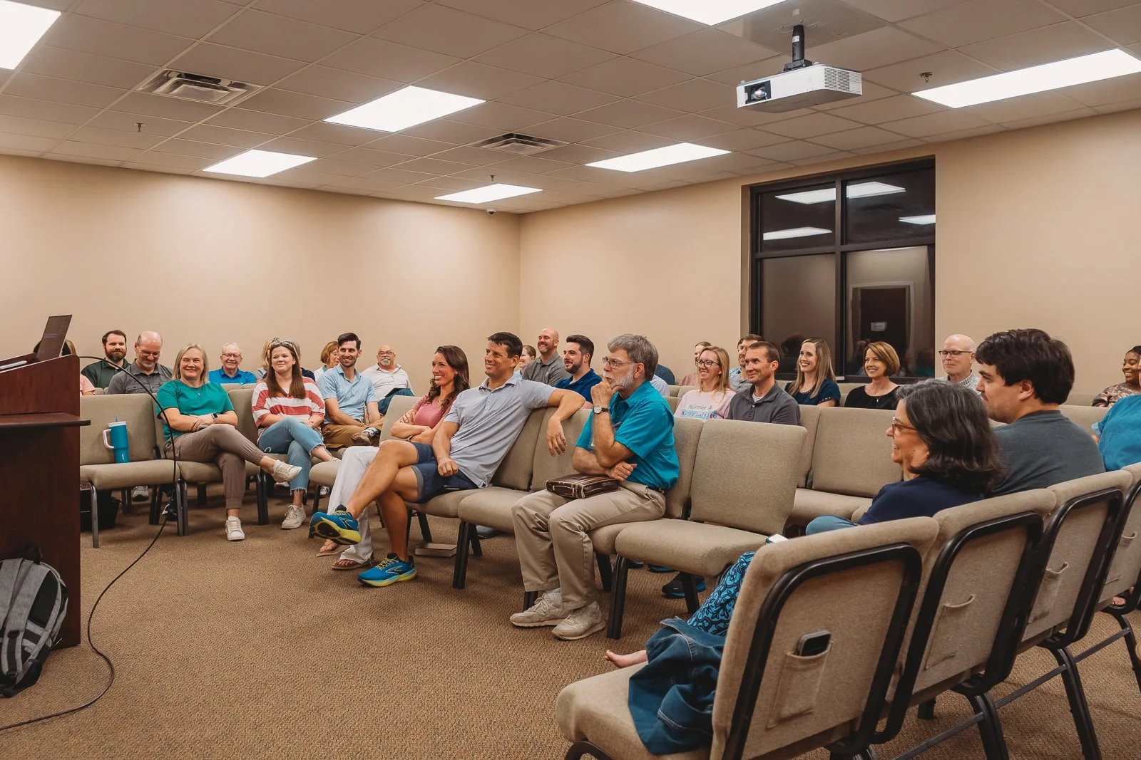 Classroom of adults from Young Families class sitting during Bible class