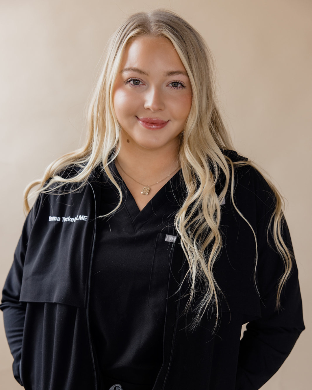 Emma, esthetician at Refined Aesthetics and Wellness in Logan, Utah – expert in advanced skincare, anti-aging facials, and personalized treatment plans