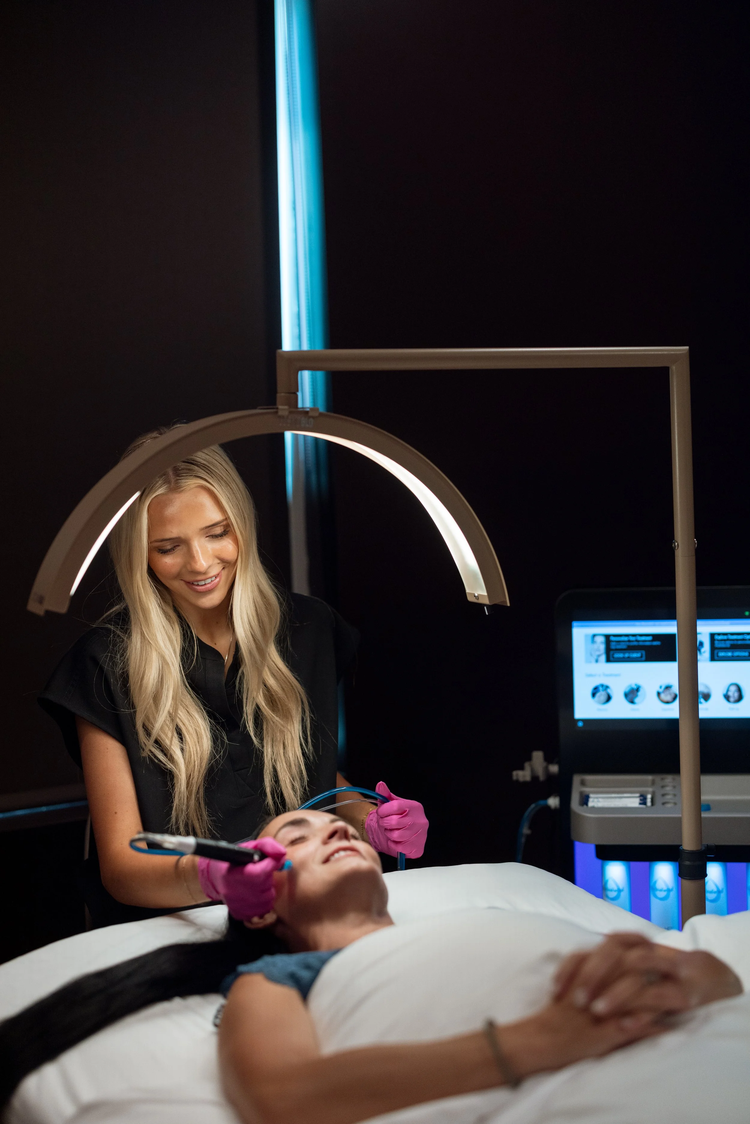HydraFacial treatment in progress at Refined Aesthetics and Wellness in Logan, Utah – deep cleansing and hydrating facial for radiant skin.