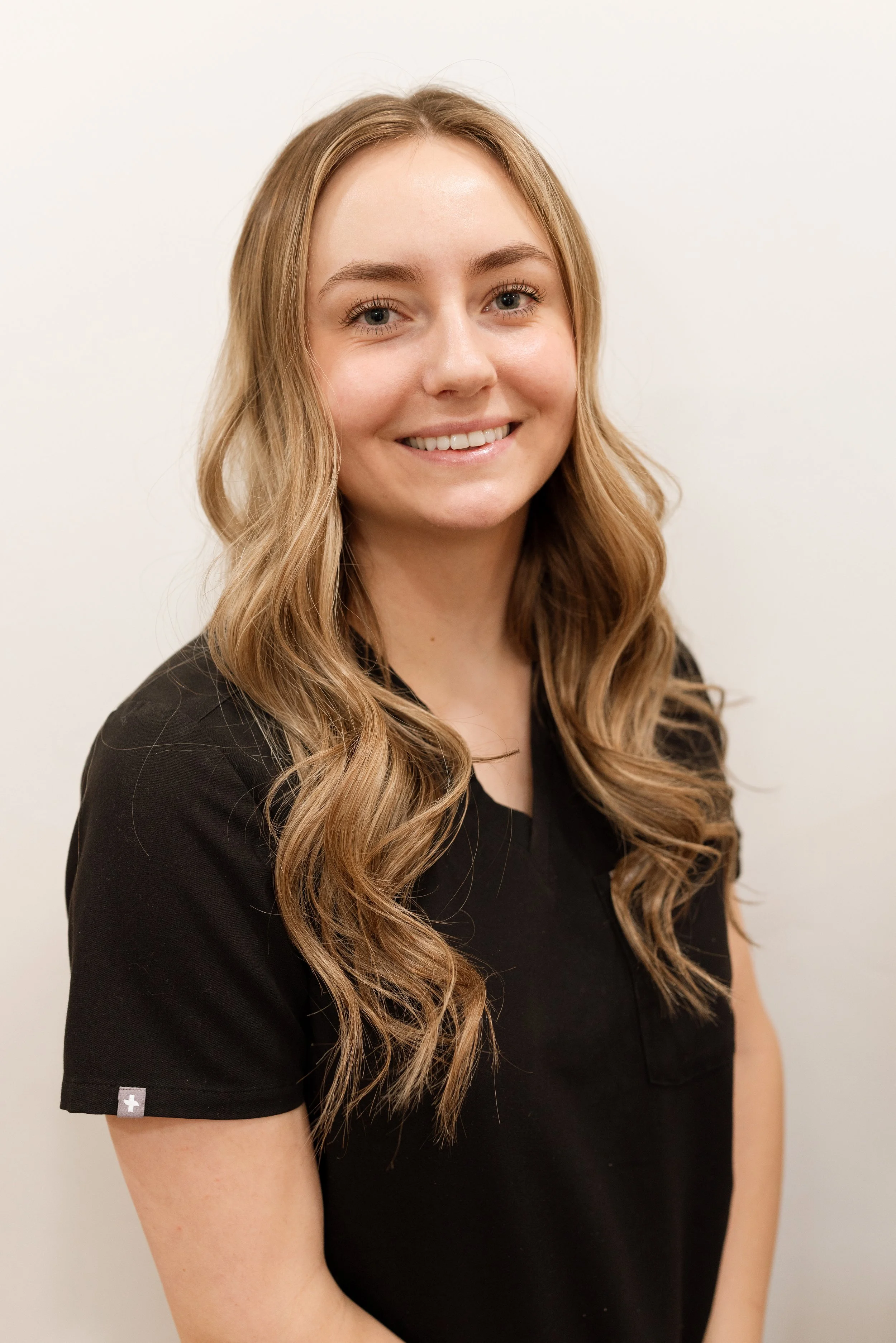 licensed esthetician from Refined Aesthetics and Wellness in Logan, Utah – focused on acne treatment, skin rejuvenation, and healthy skin maintenance