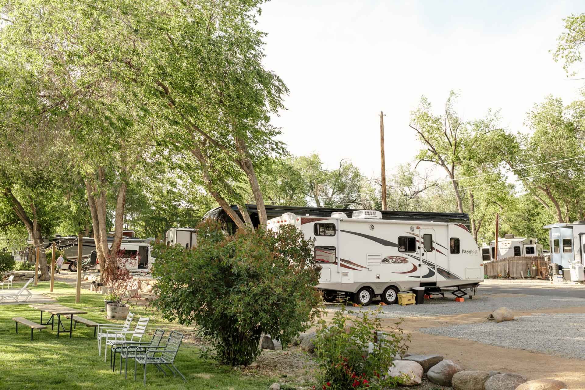 RVs-parked-near-green-grass-and-outdoor-seating.jpg