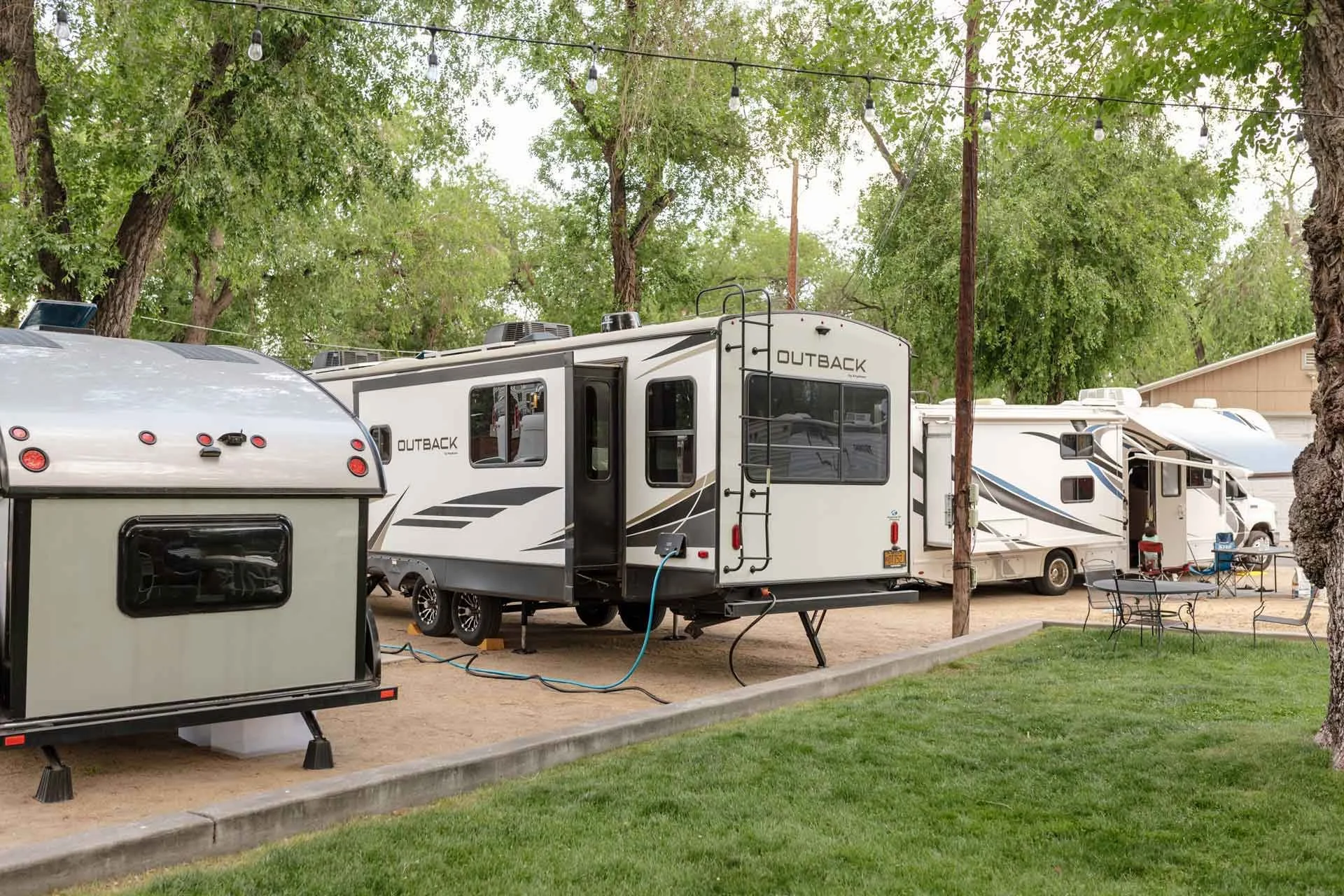 RVs-backed-up-to-a-green-lawn.jpg