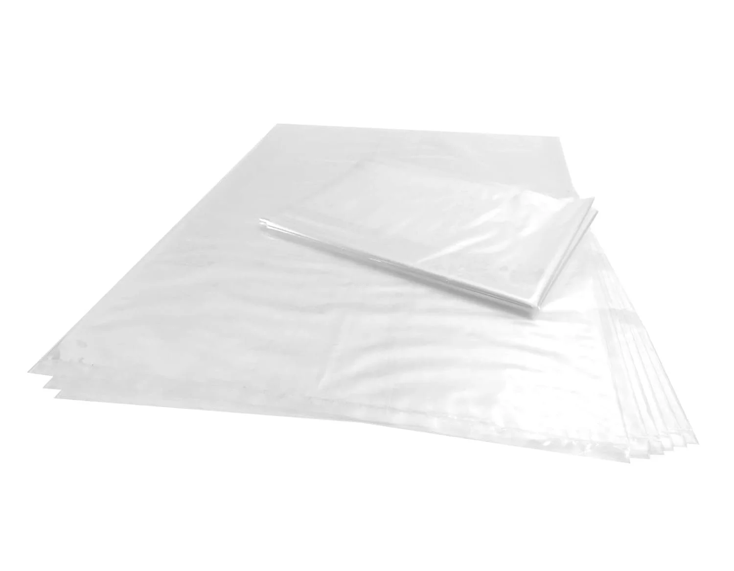 Stack of clear plastic ziplock bags on a white background.