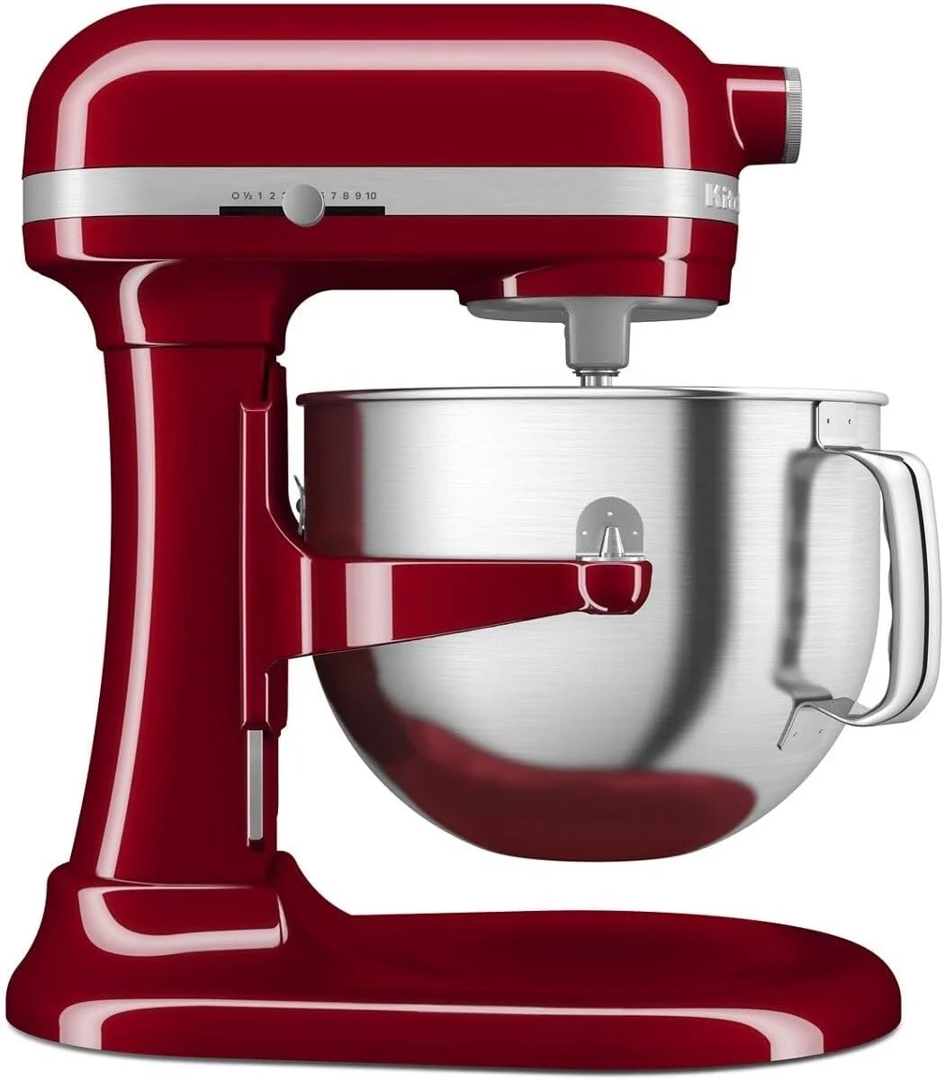 Red KitchenAid stand mixer with a stainless steel mixing bowl.