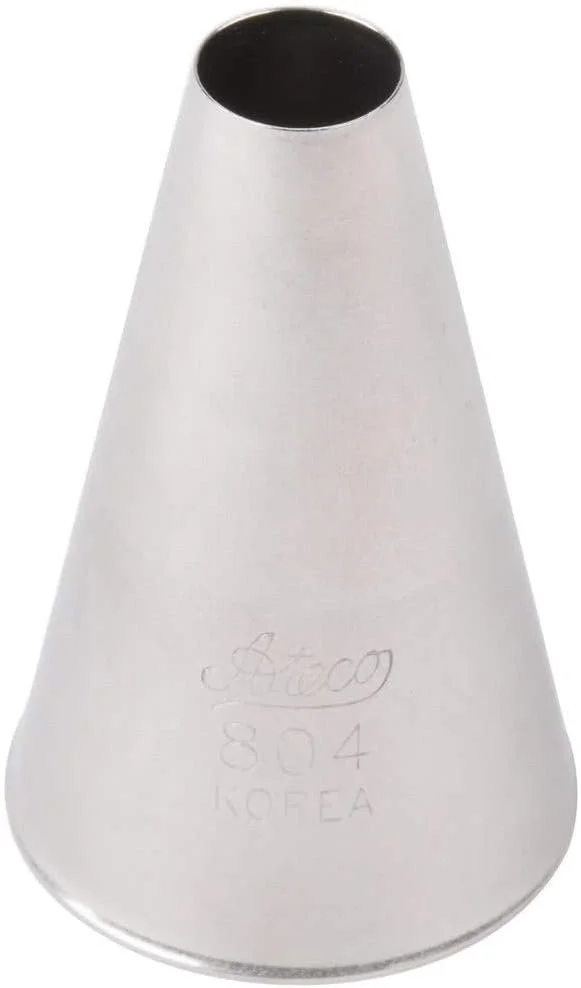 A silver metal piping tip cone-shaped decorator tip for cake decorating