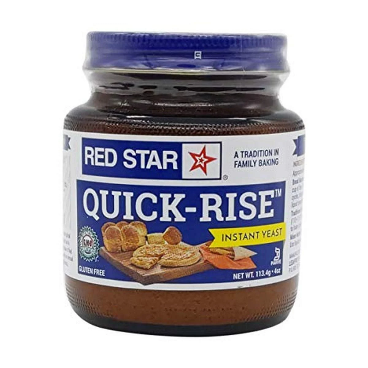 A jar of Red Star Quick-Rise Instant Yeast with a blue lid and label, showing images of baked bread and rolls on the front.