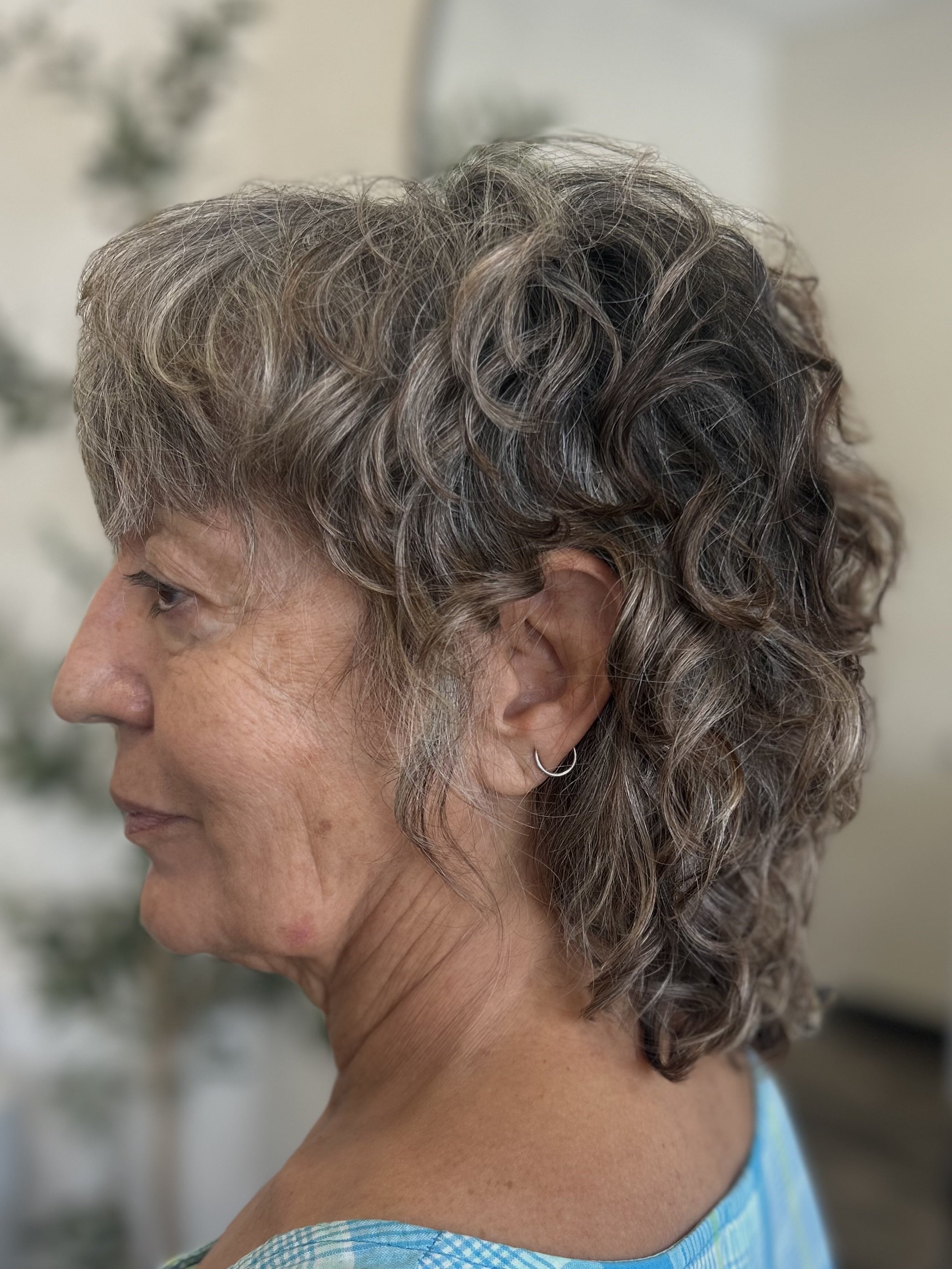 Short shag curly cut on wavy hair in Sarasota 