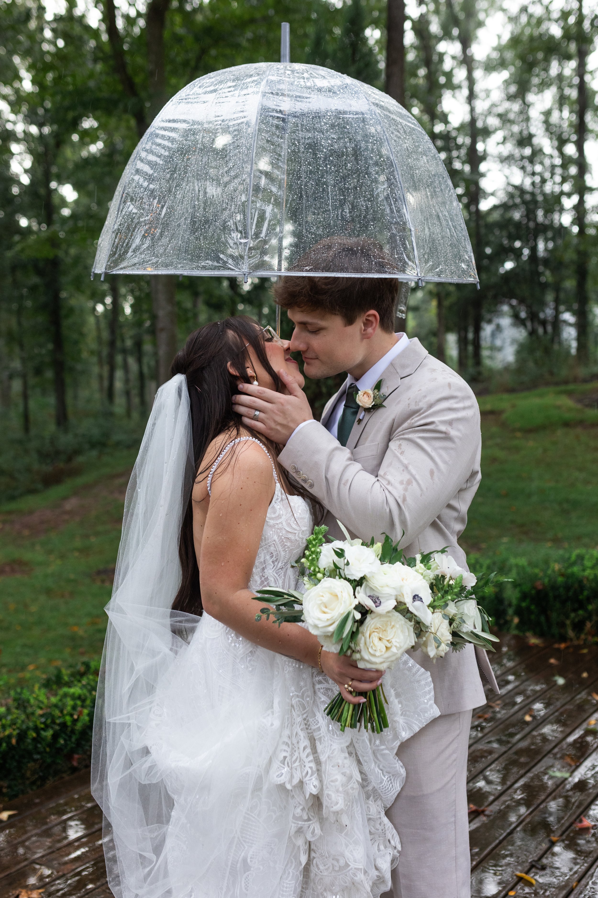 Documentary style wedding photos in the rain