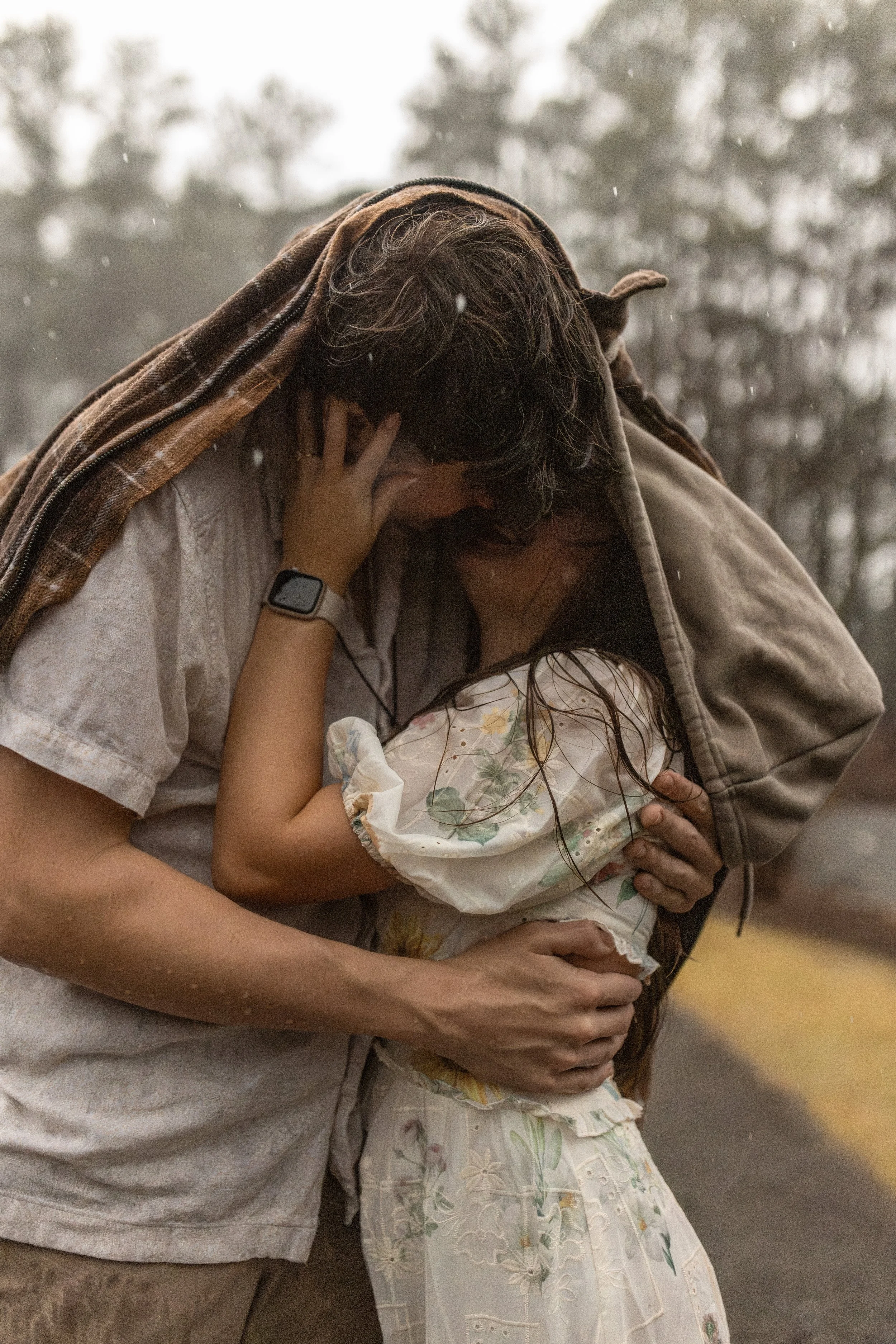 romantic intimate rainy day proposal and engagement photos