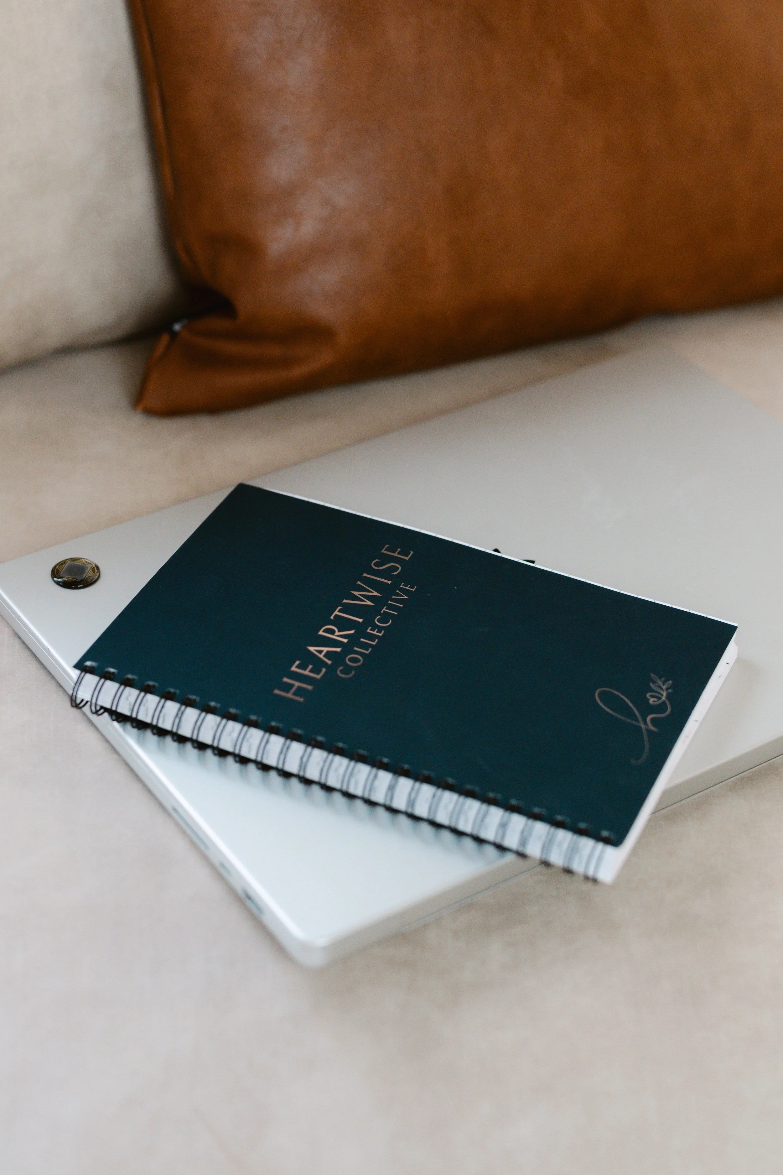 Orthodontic consultants Courtney Gutierrez and Lindsay Quinn smiling at the camera back to back