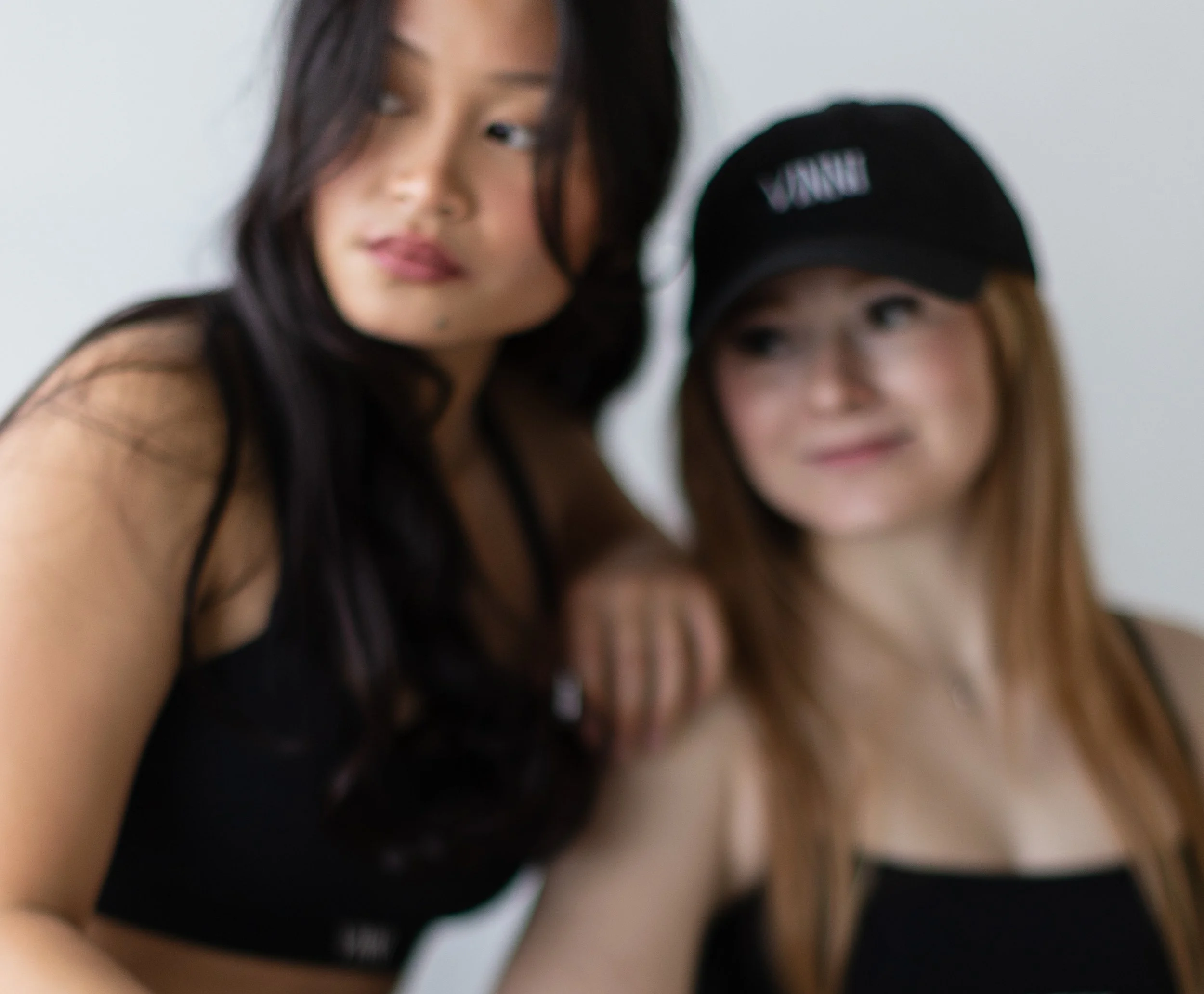 Two TrueWest models wearing Vinni THE label