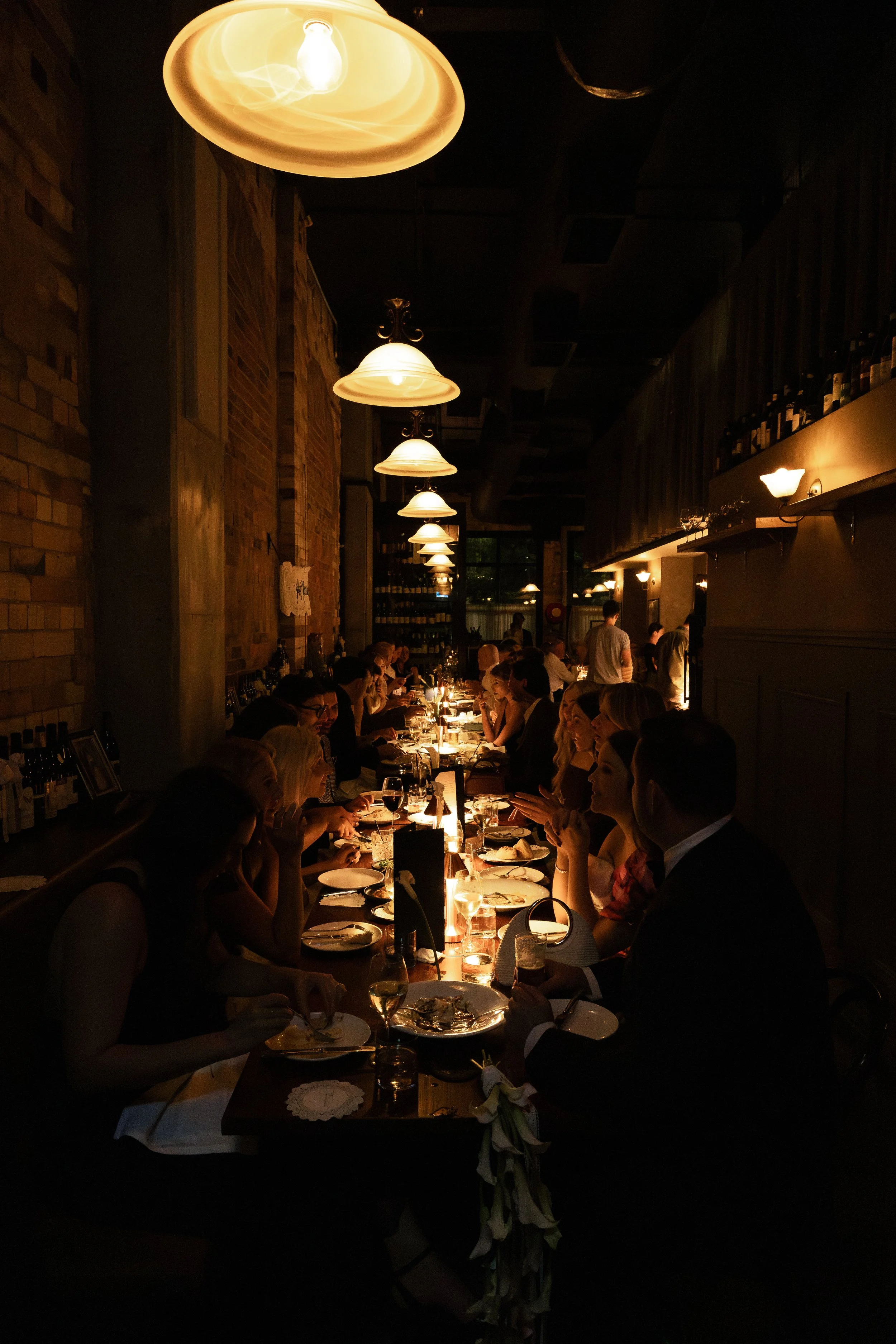 Indoor restaurant dining room at Rosmarino, Fortitude Valley — moody candlelit setting for group events