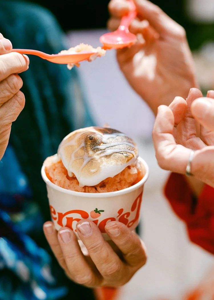 A guest being served a cup of Bernie’s granita at an event