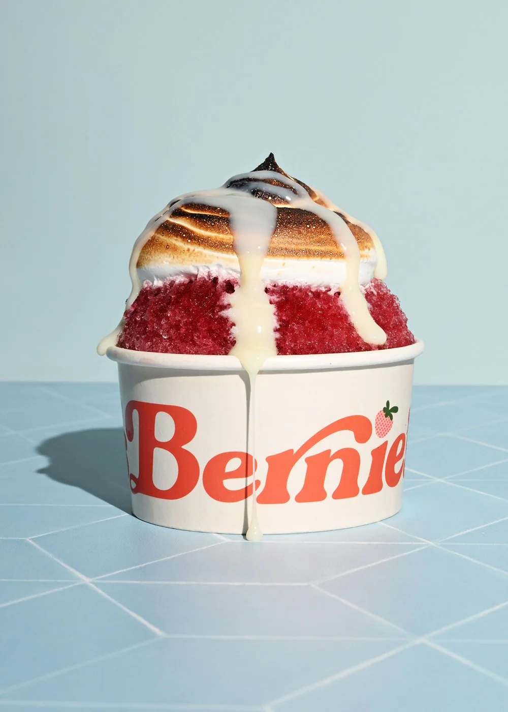 Guests enjoying Bernie&rsquo;s Italian ice with a spoon