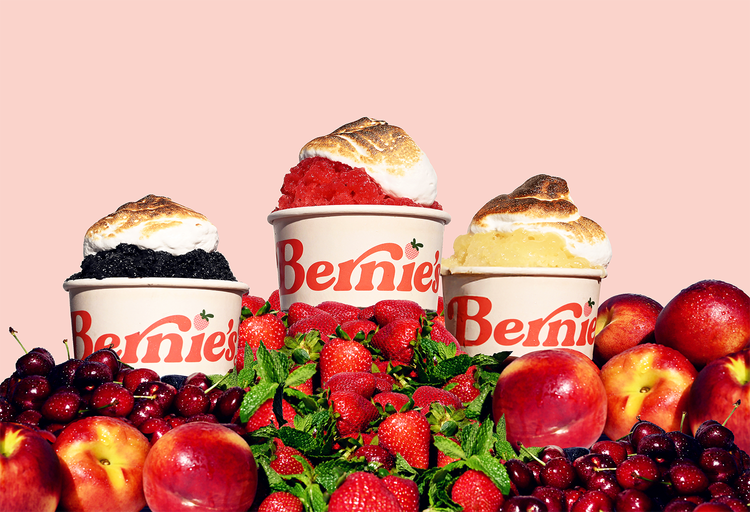 Three cups of Bernie’s granita — black sesame, strawberry, and lemon — topped with torched meringue and nestled in fresh fruit