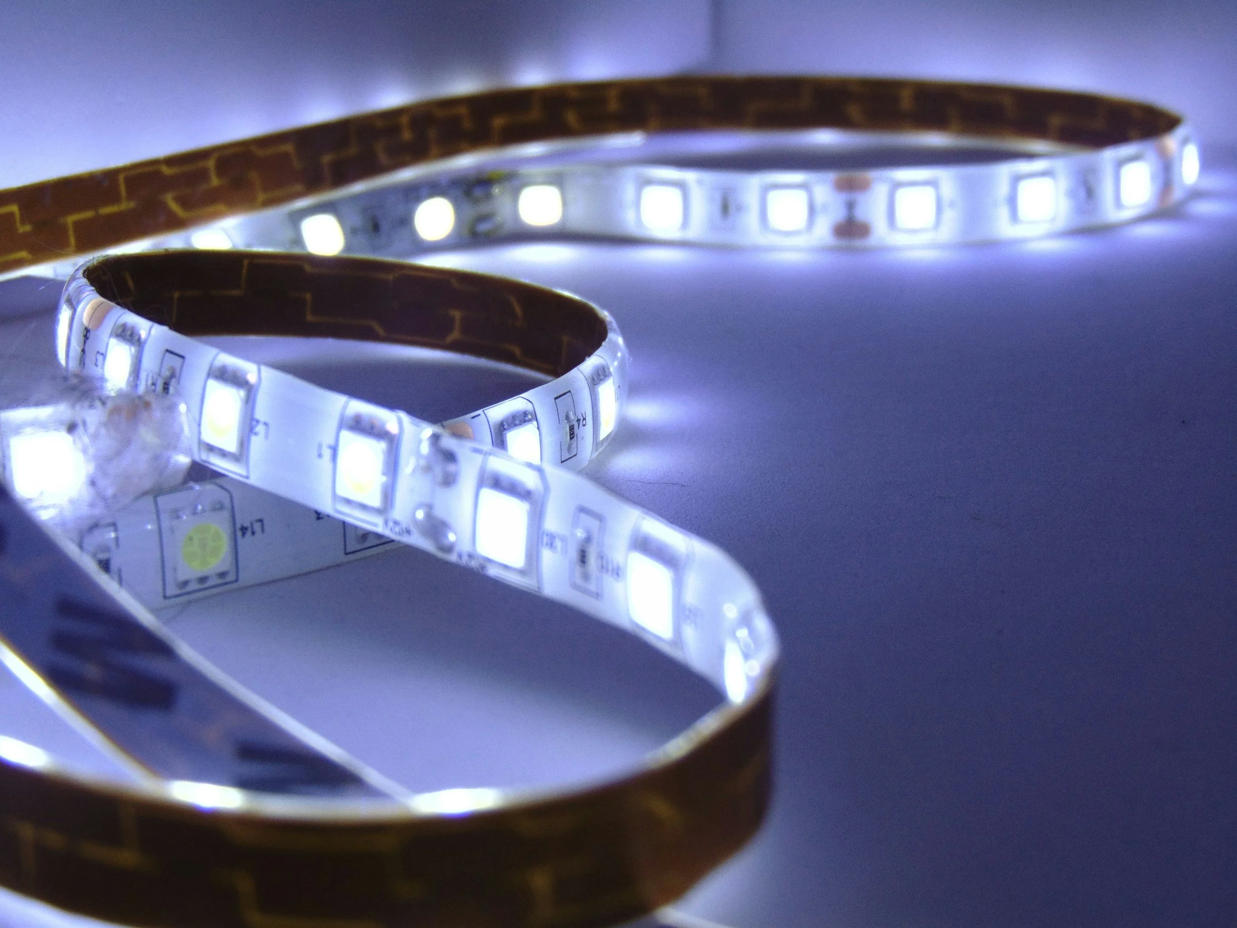 Electrician installing LED interior and exterior lighting Auckland home