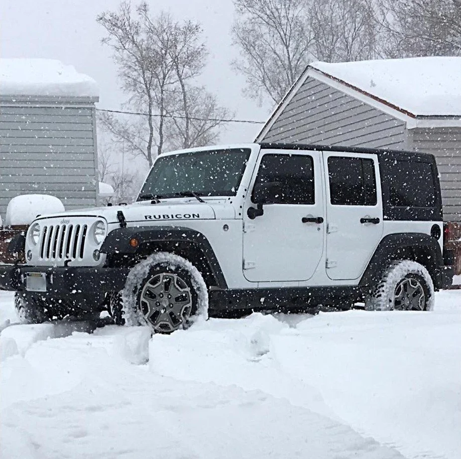 Tinted Jeep Rubicon in the snow