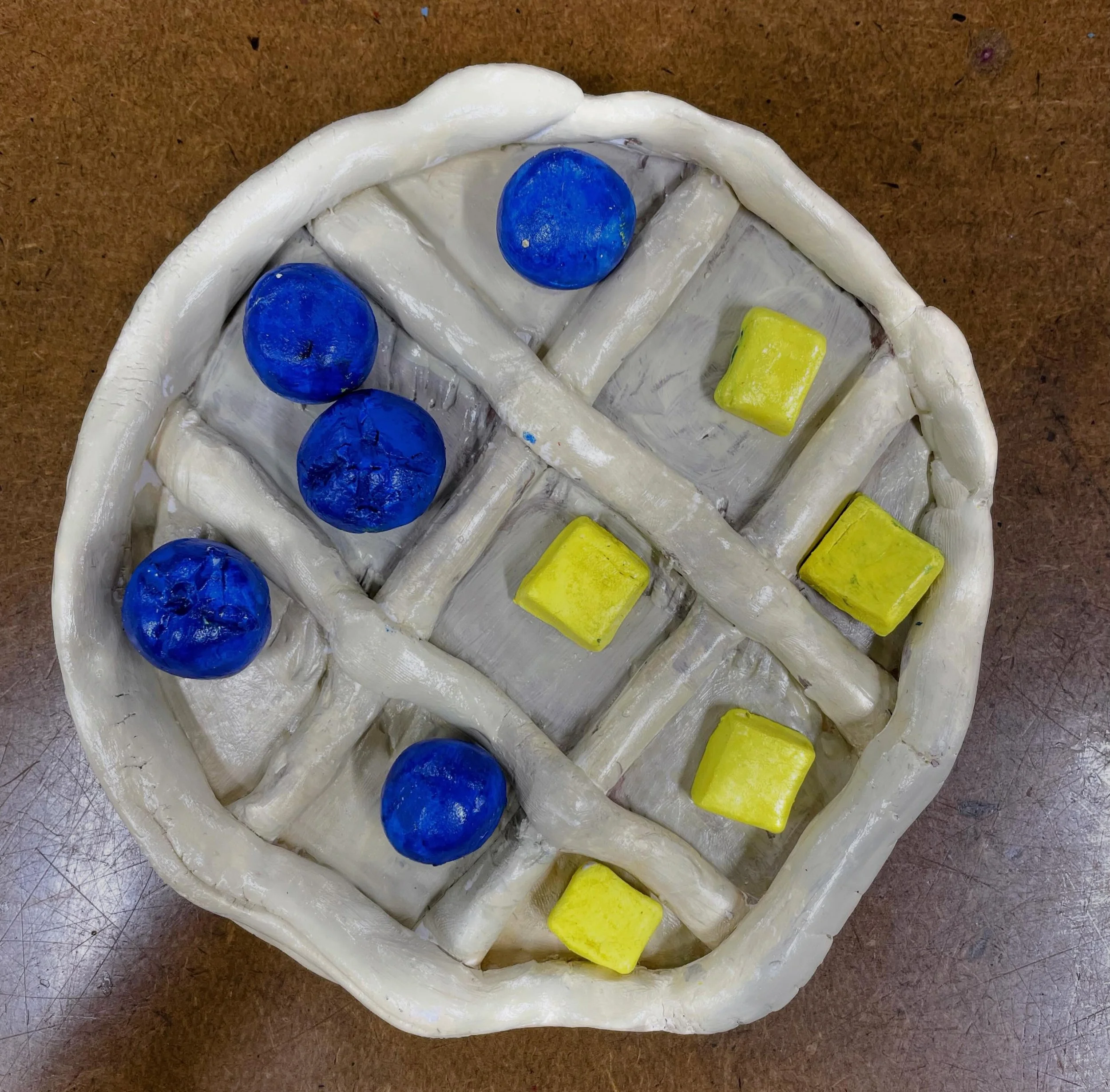 TIC-TAC-TOE BOARDS!!! These fun clay projects are complete and ready for my 6th graders to find an opponent and play. I love their creativity here, from pancakes to duck ponds to chess boards! 

#tictactoe #clayprojects #clay #sixthgrade #artclass