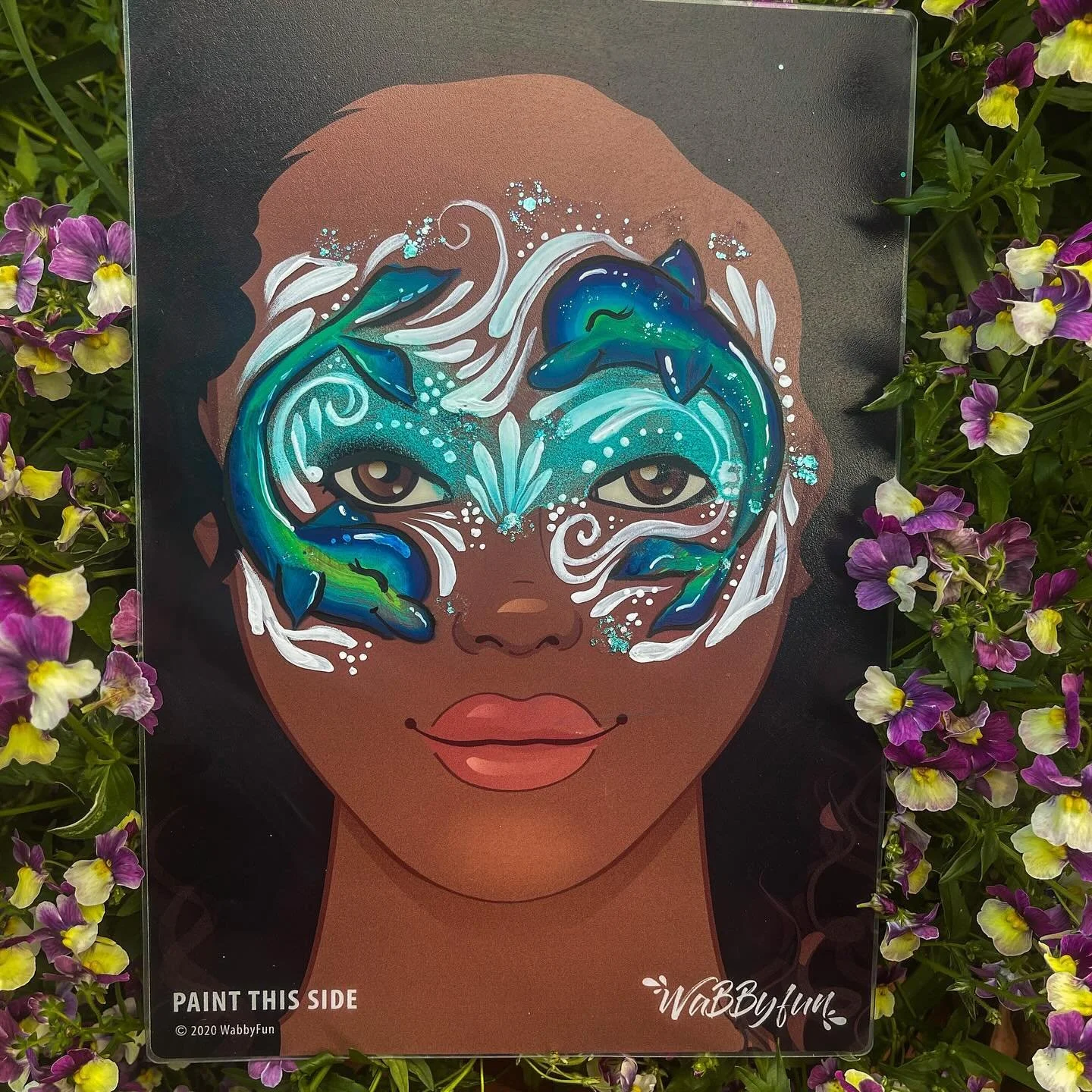 Some cute playful dolphins in a mask design. I definitely want to try experimenting with colourful dolphins in the future!

#facepainting #facepaintingcanberra #facepaintingdesign #childrensfacepainting #kidsfacepainting #facepaintingpractice #dolphi