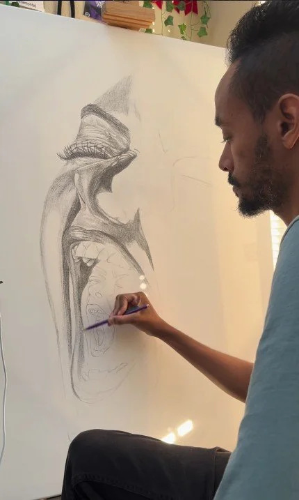 a man drawing