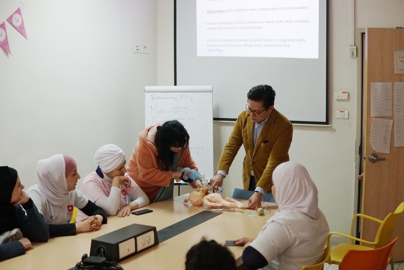 Committee member and Ball founder Dr. Michael Espiritu teaching providers at the Hospital. Dr. Espiritu is an Assistant Professor of Clinical Pediatrics in the Division of Newborn Medicine at Weill Cornell Medicine and Assistant Attending Pediatricia