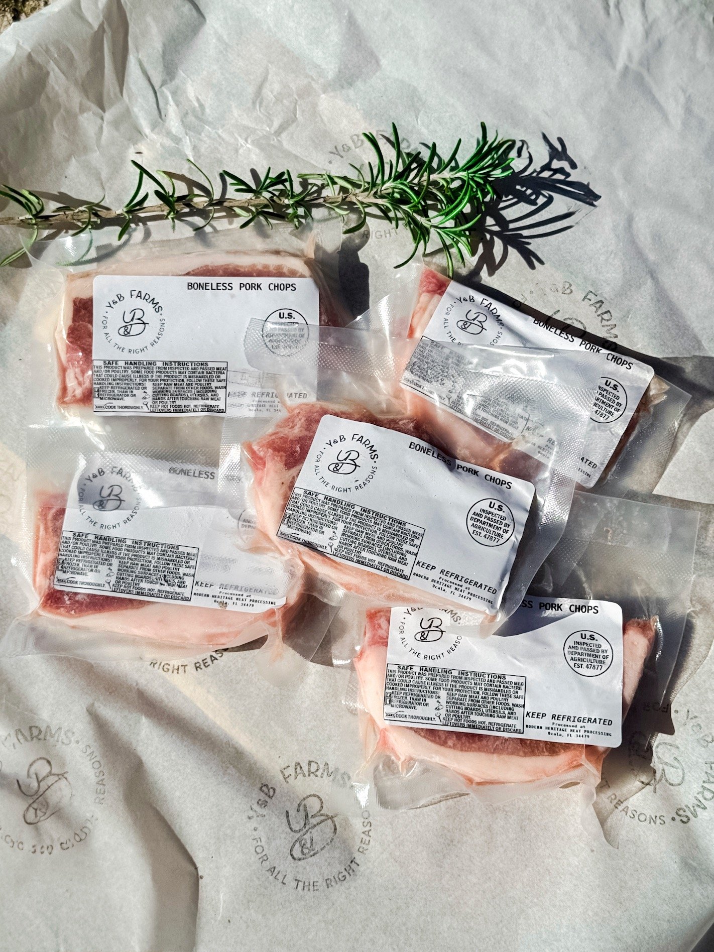 Pasture-raised boneless pork chops from Y&B Farms, USDA-inspected and vacuum-sealed.