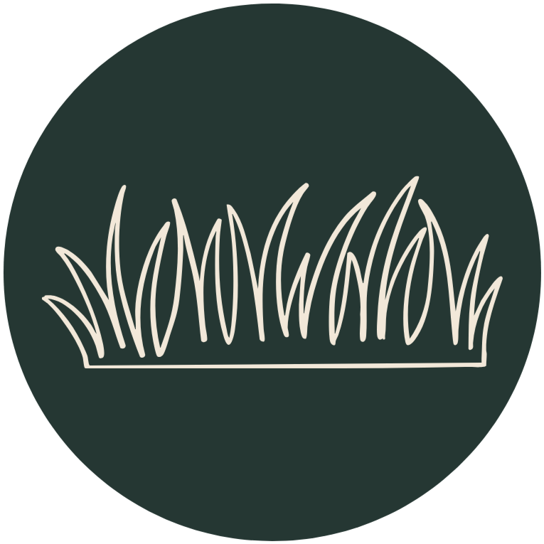 Forest green circle and grass icon inside