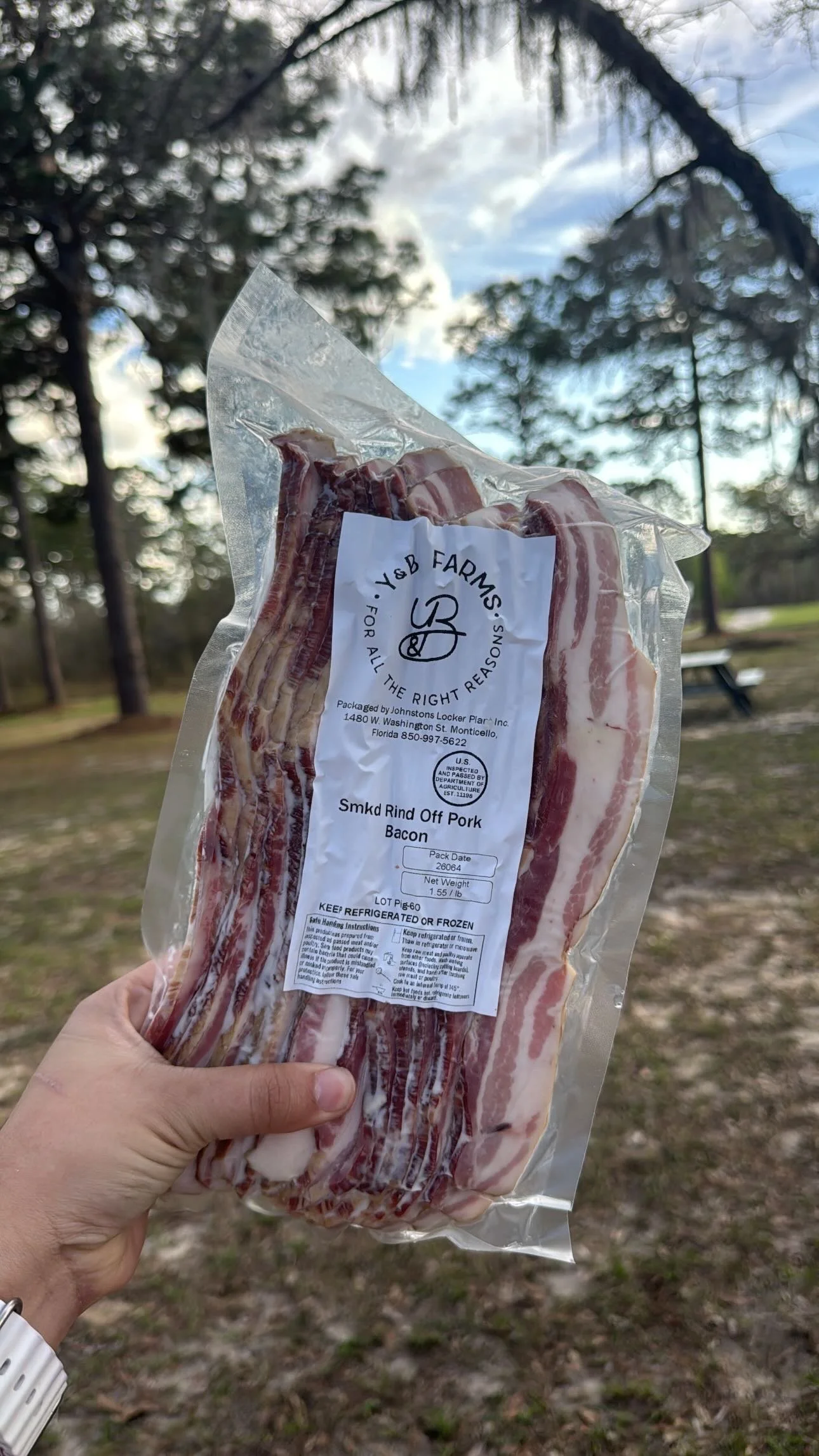 Smoked Rind Off Pork Bacon vacumm sealed, Y&B Farms and USDA inspection mark.