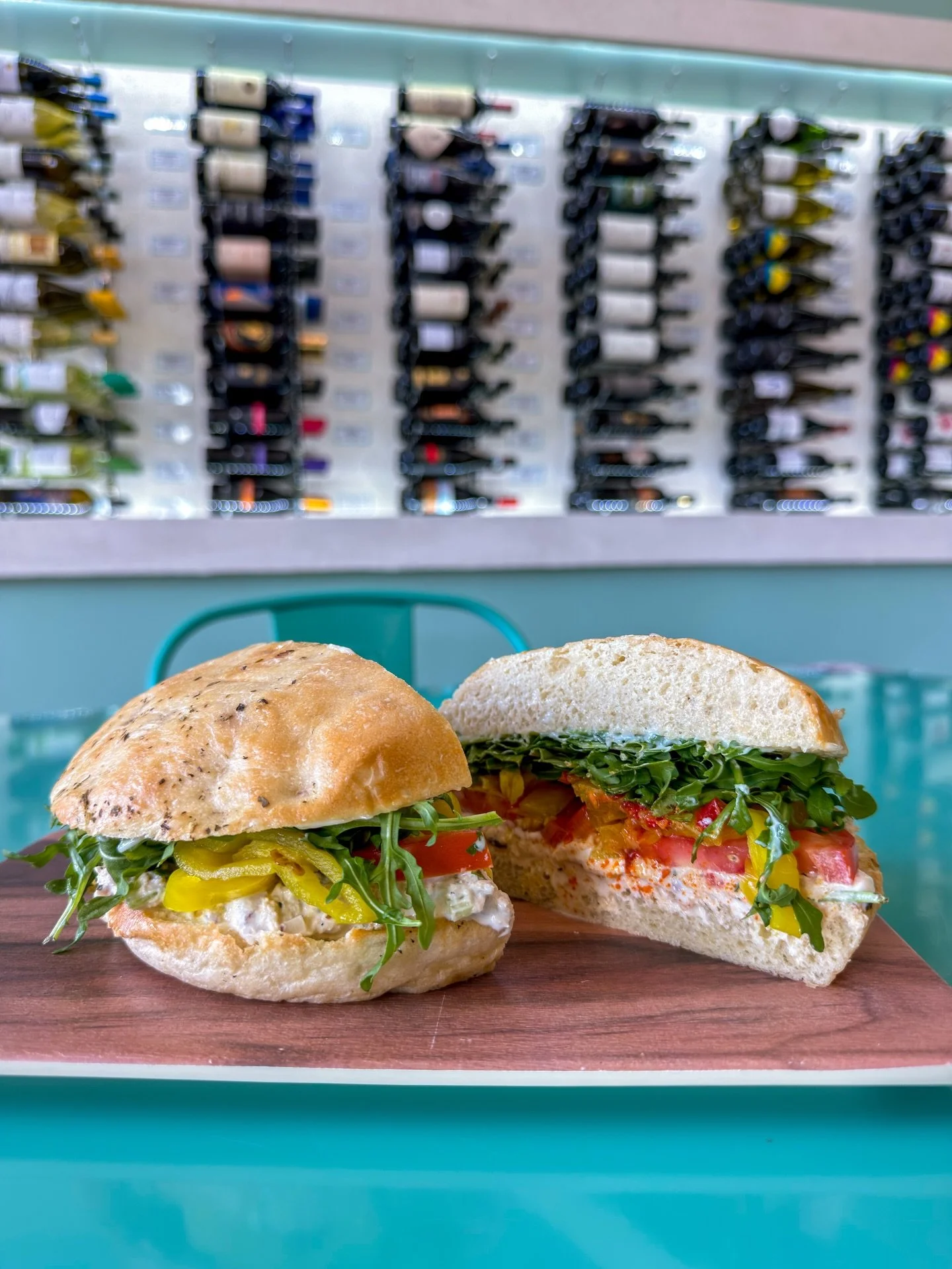 Not all tuna sandwiches are created equal.

Ours starts with house-made albacore tuna salad, creamy and cool, layered with ripe sliced tomato, peppery baby arugula, and tangy pepperoncini rings. All of it stacked on handcrafted bread that holds up to