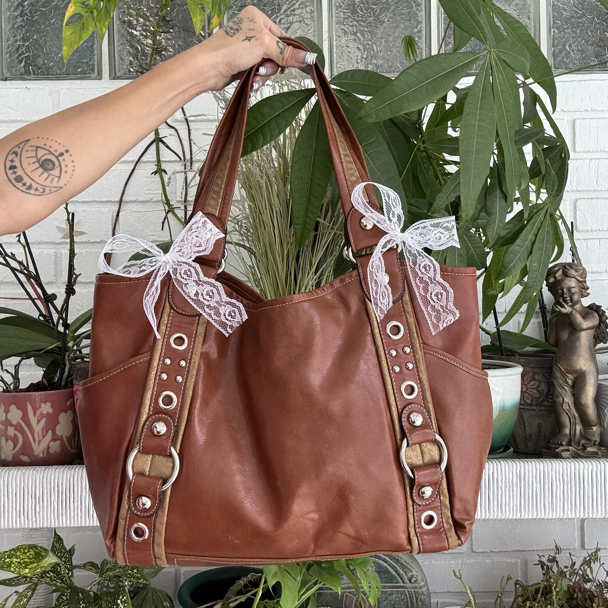 Kathy Van Zeeland Brown Faux Leather Grommet Tote Bag